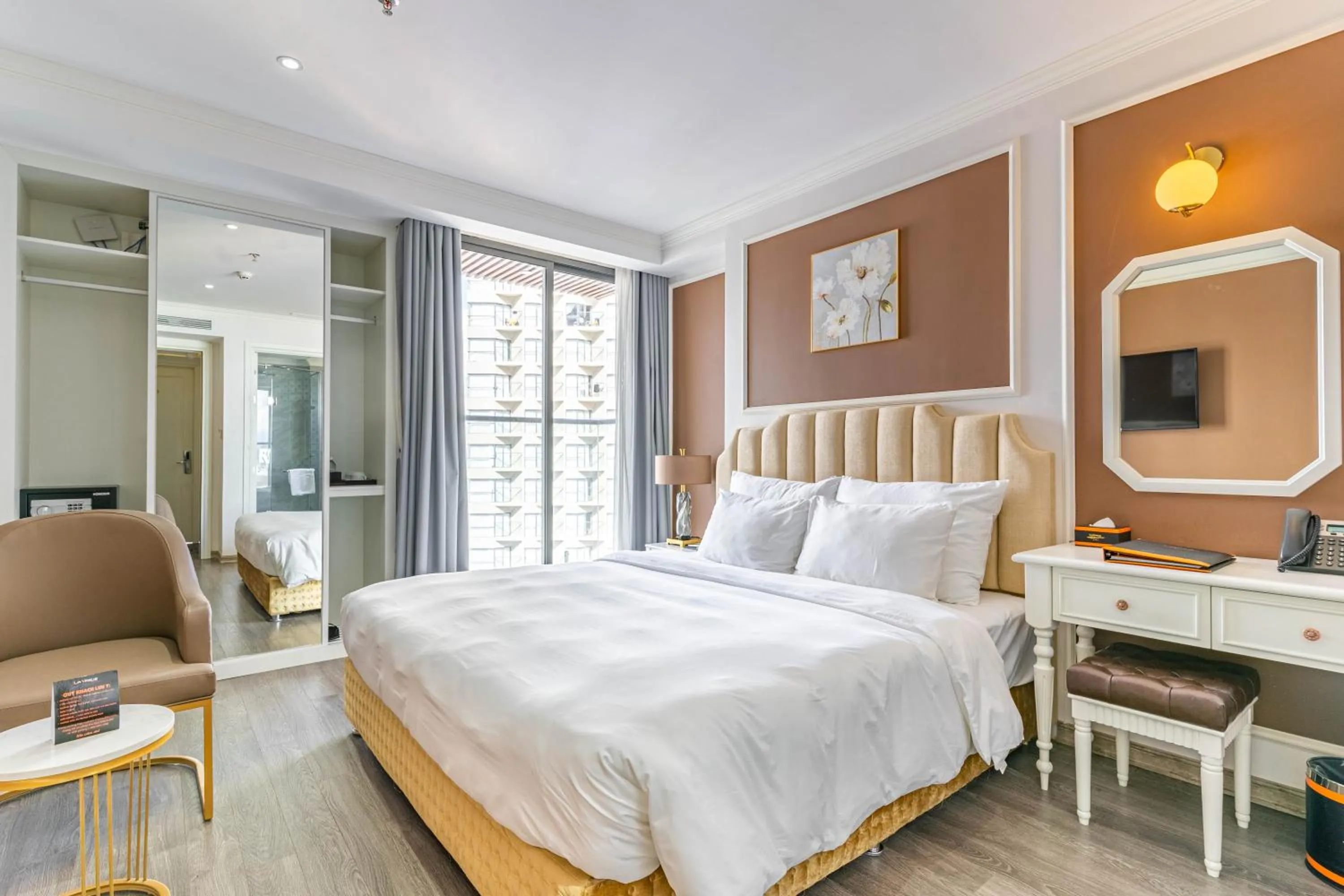 Bed in La Vague Hotel