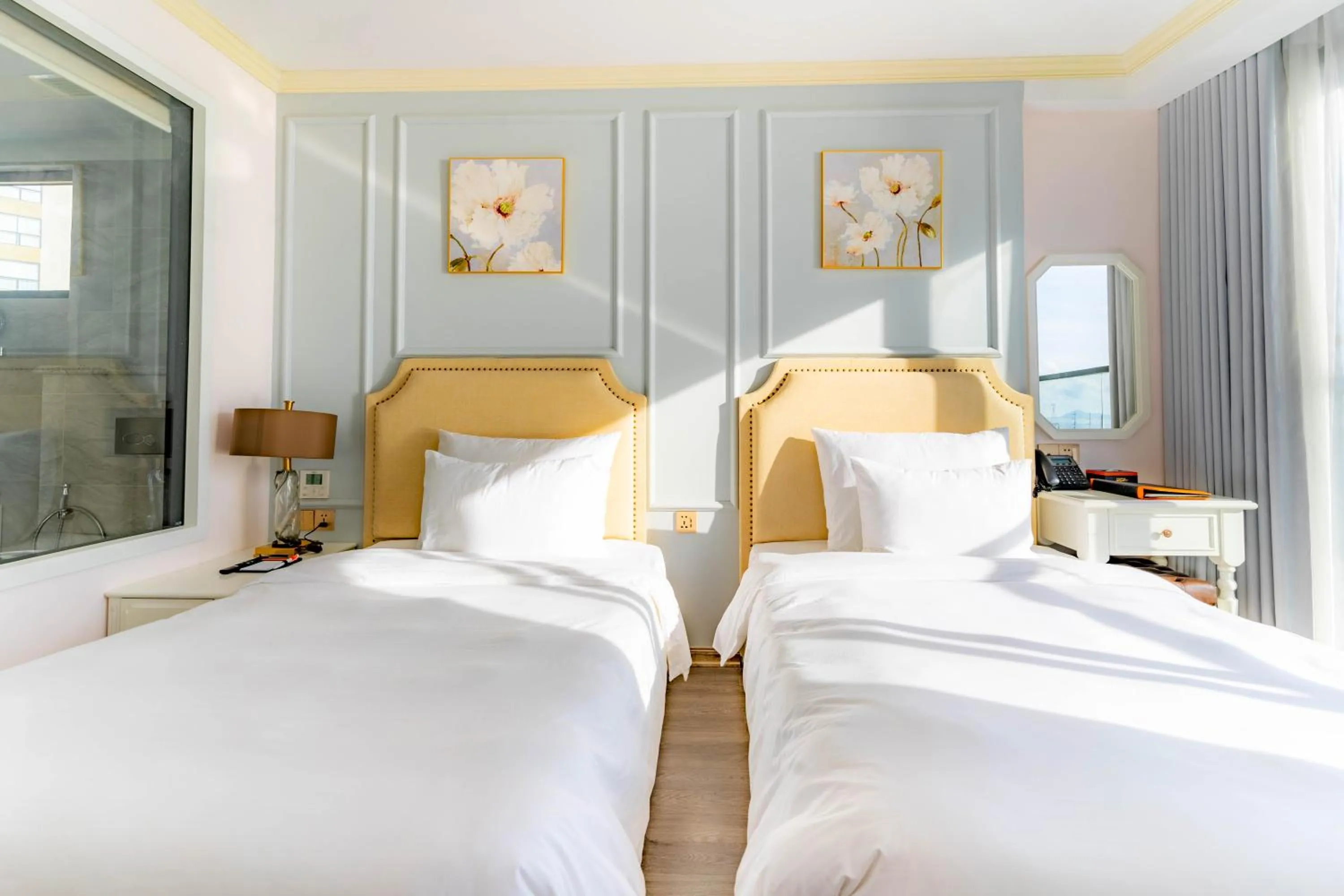 Bed in La Vague Hotel