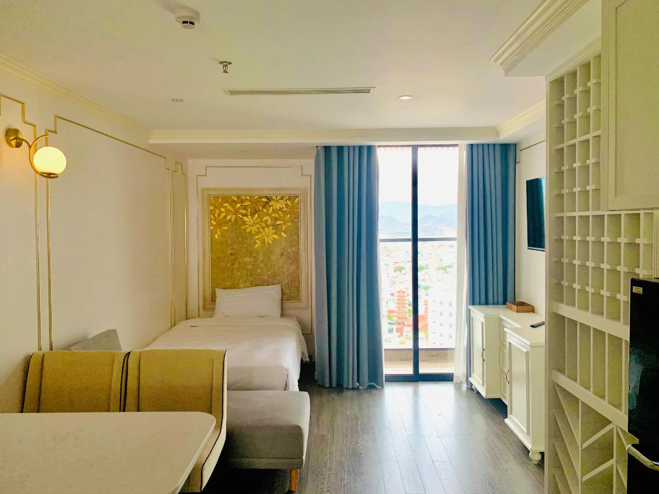 Bed in La Vague Hotel