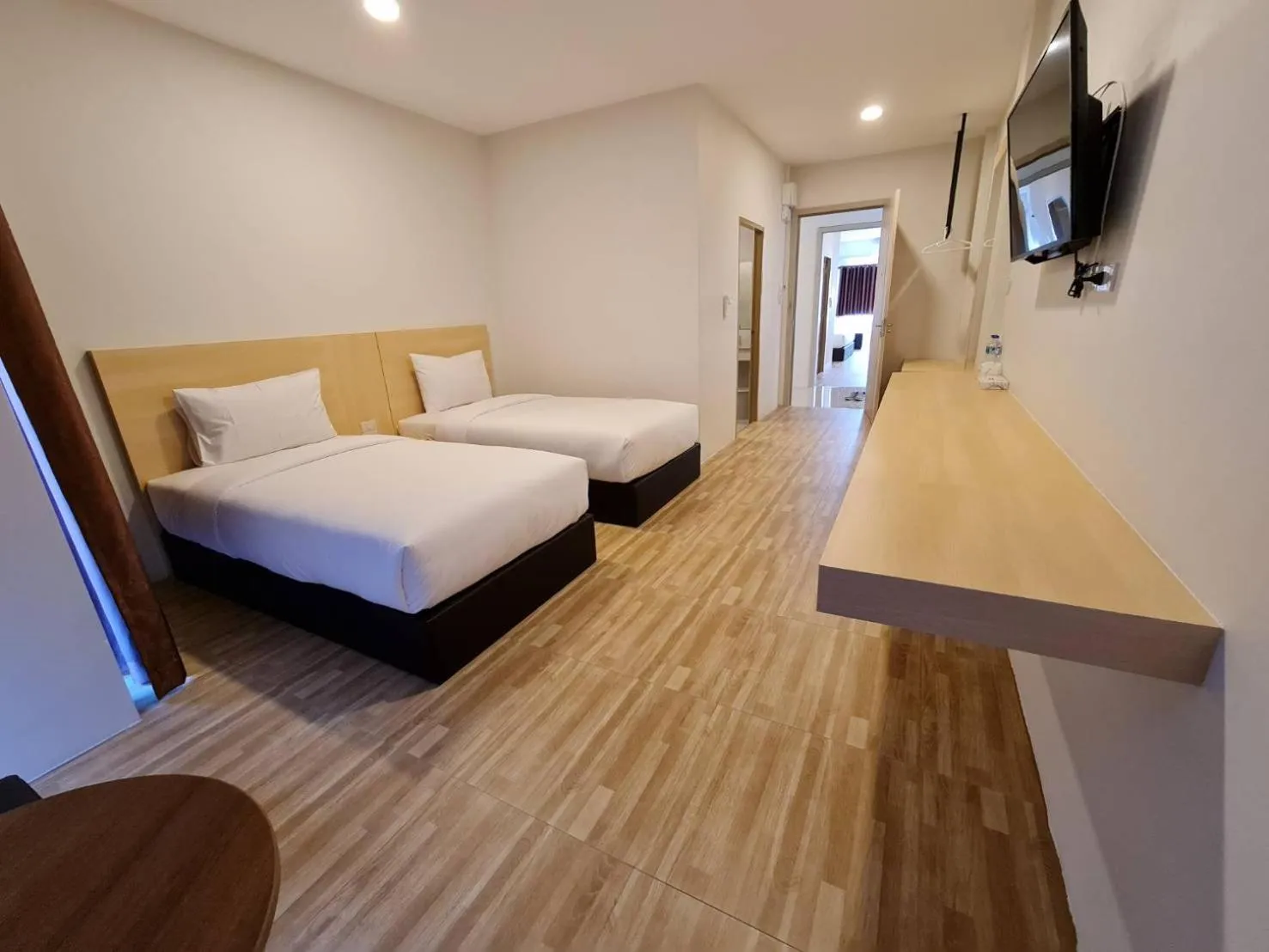 Bed in The charlotte smart hotel lopburi