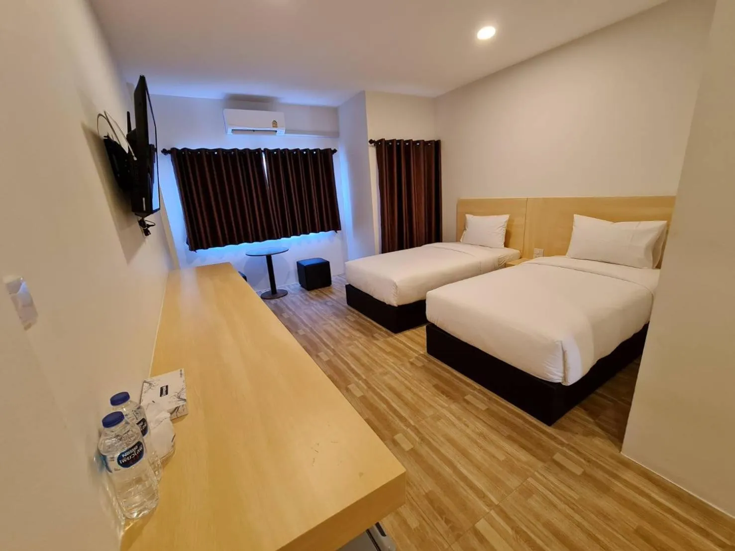 Bed in The charlotte smart hotel lopburi