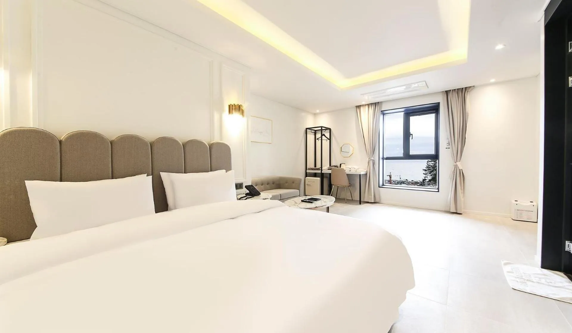 Living room, Bed in H moment Hotel songjeong