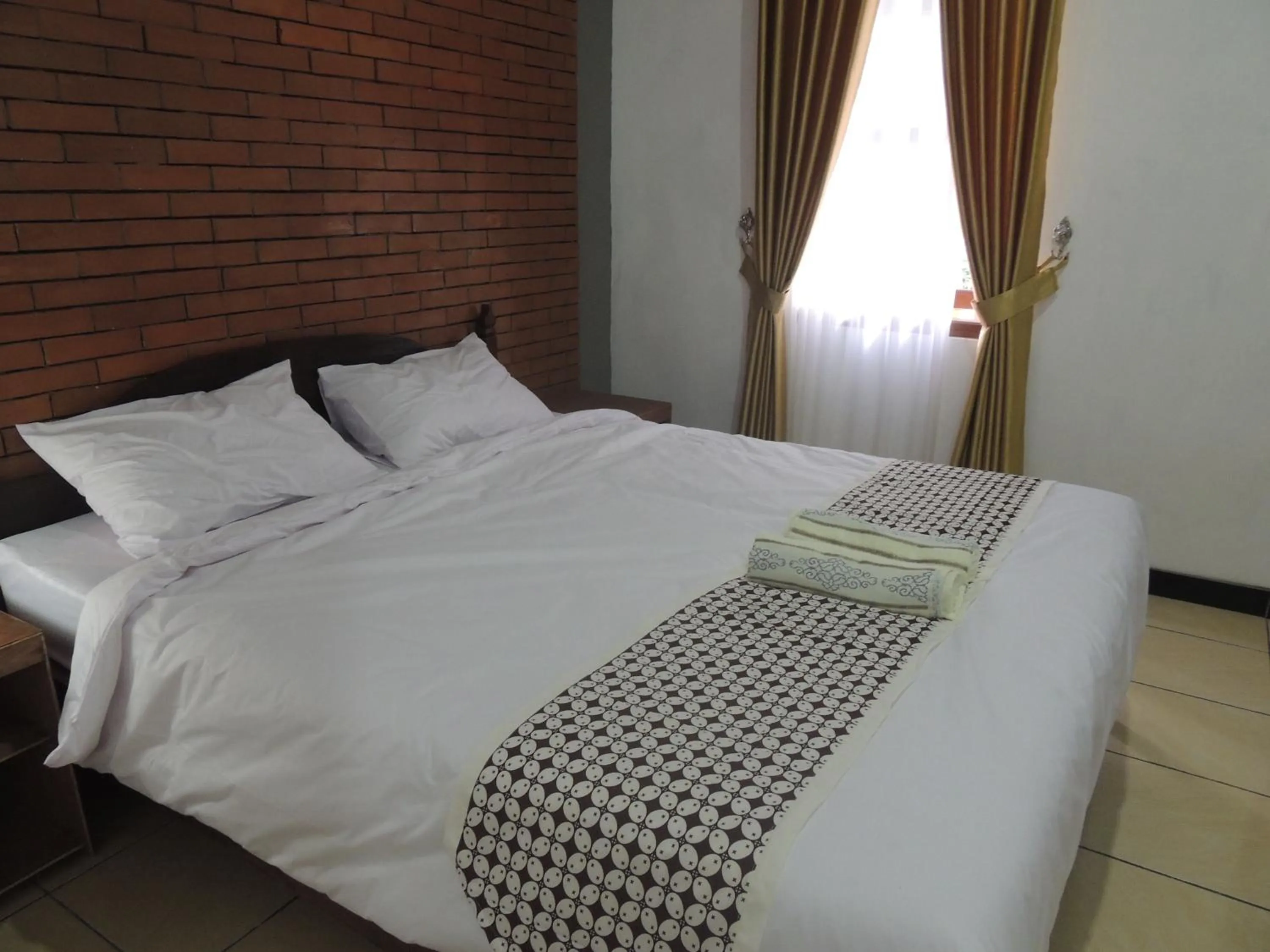 Bedroom in Omah Mardi Syariah by Ndalem Beong