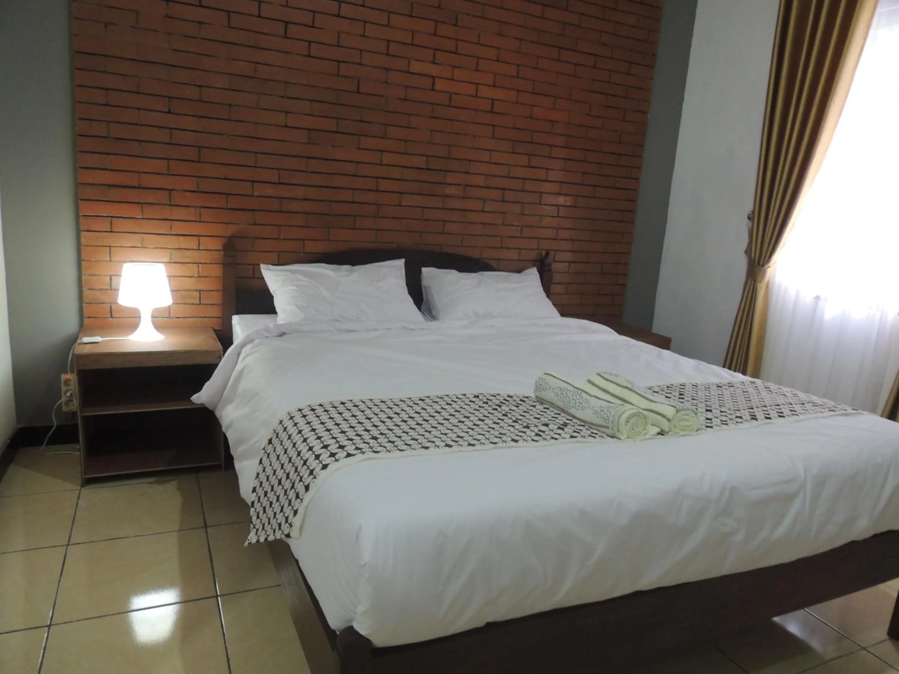 Bedroom in Omah Mardi Syariah by Ndalem Beong