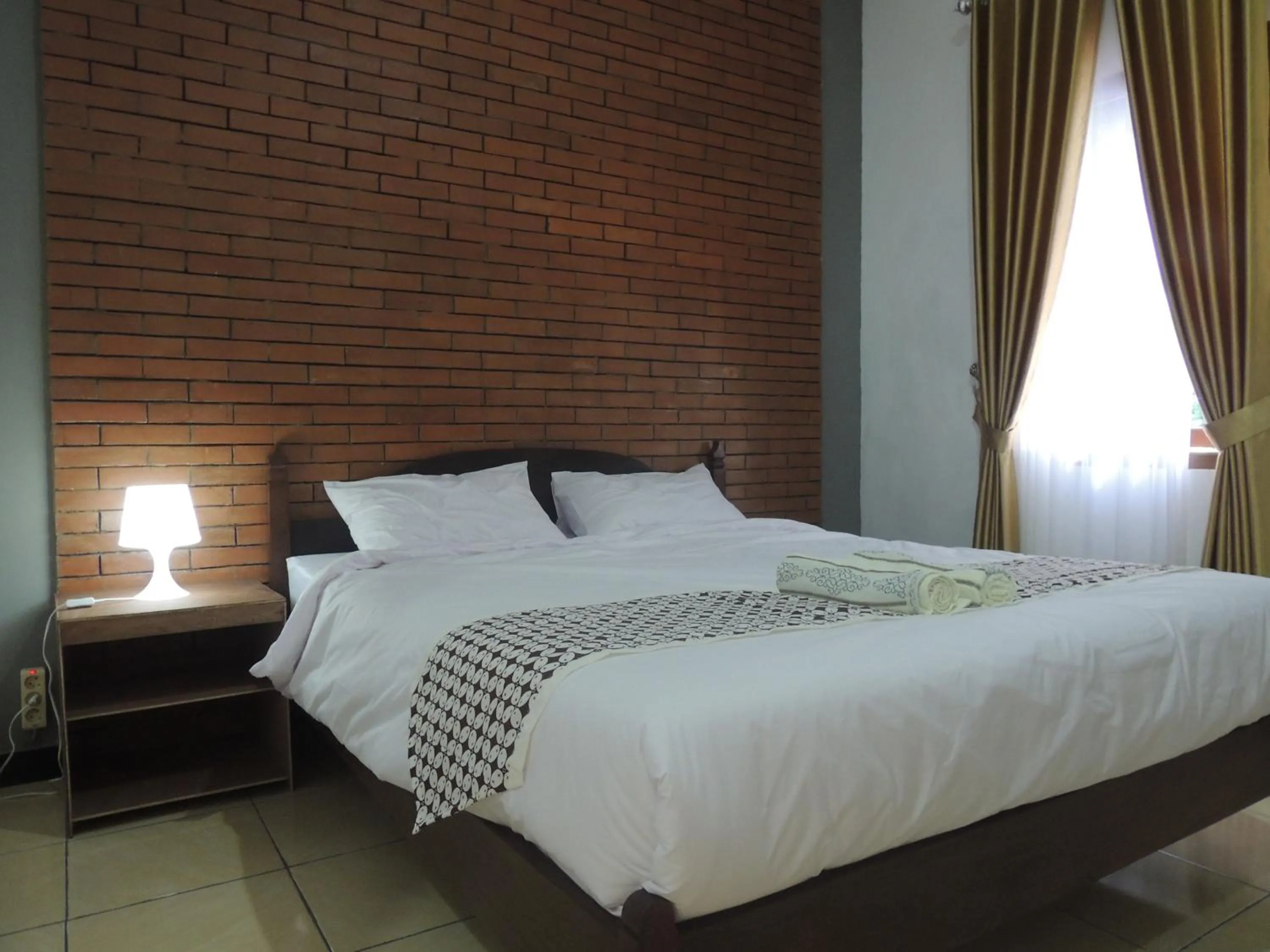 Bedroom in Omah Mardi Syariah by Ndalem Beong