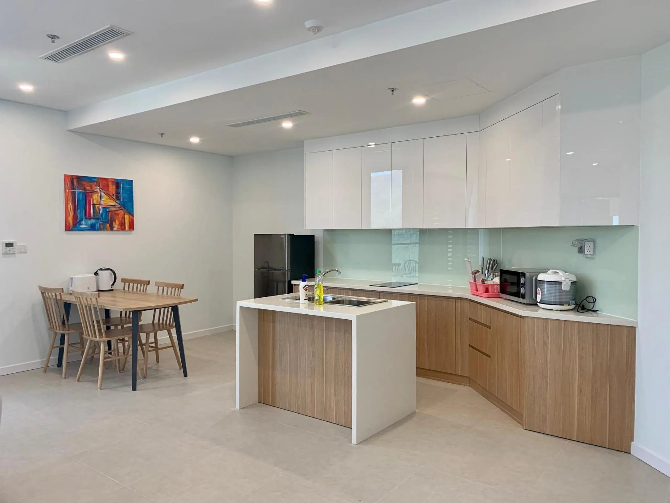 Kitchen or kitchenette in Wise Stay Scenia Bay Apartment