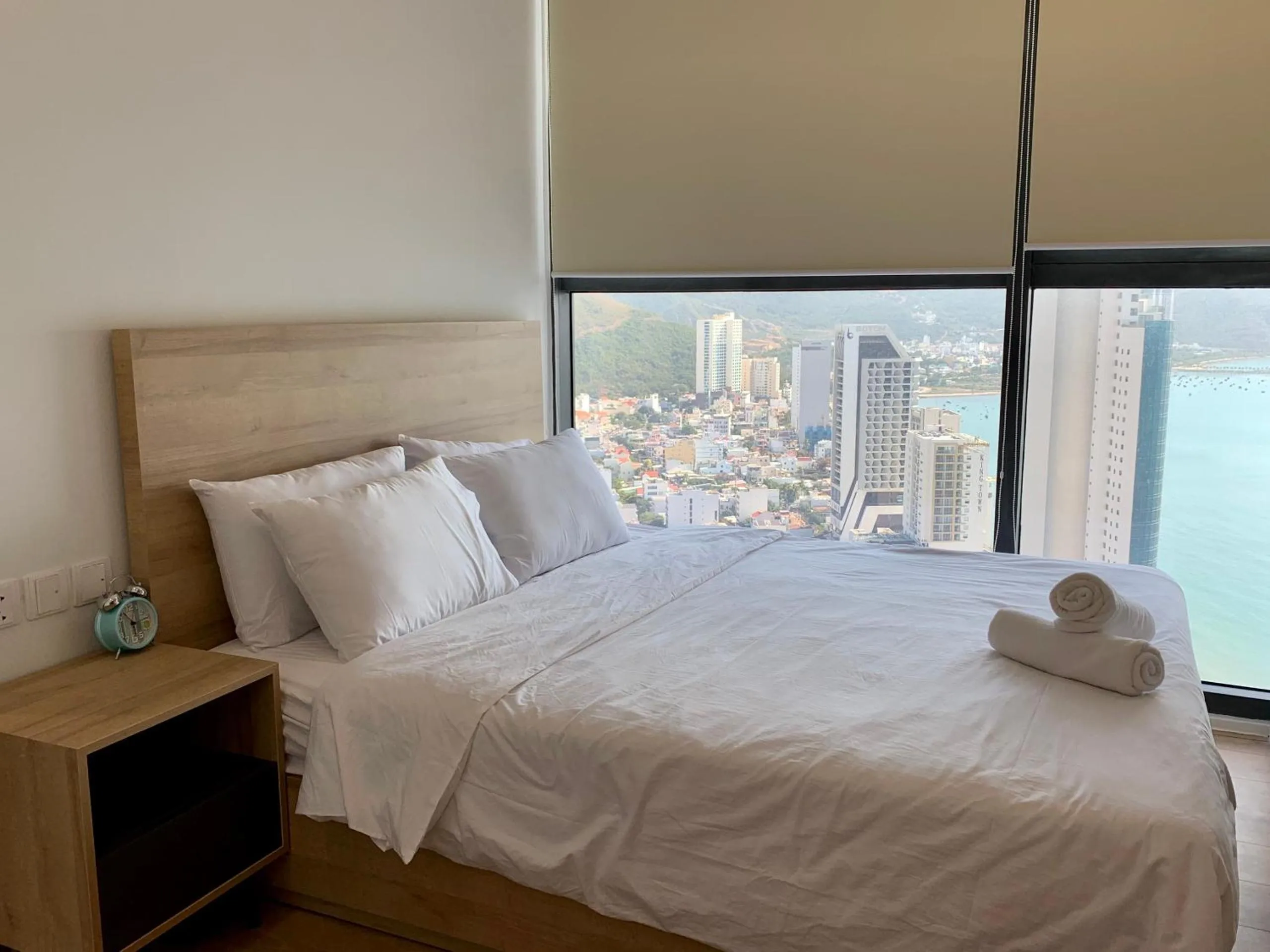 Bed in Wise Stay Scenia Bay Apartment