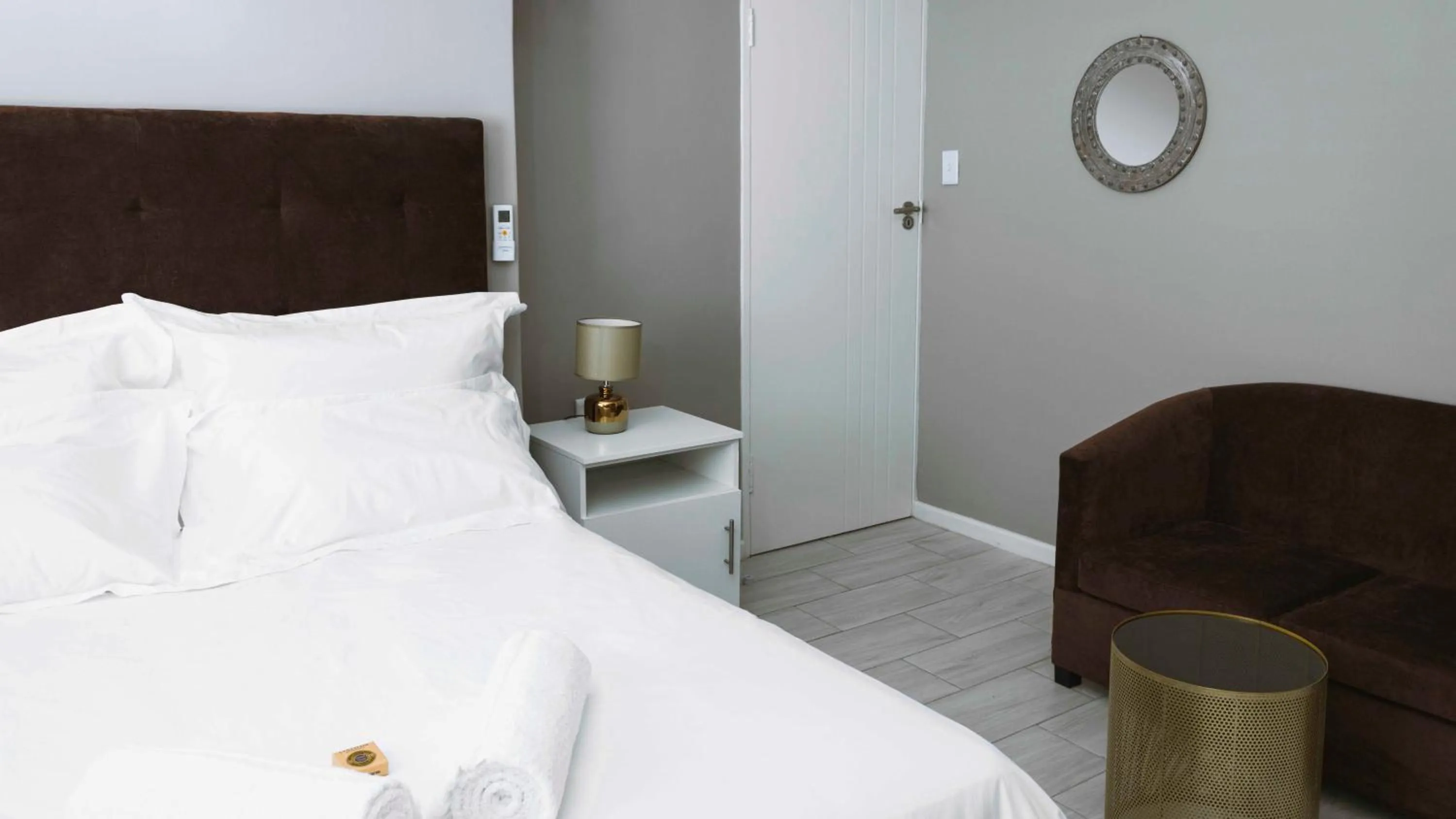 Bed in 103onWallace Self Catering Guest House