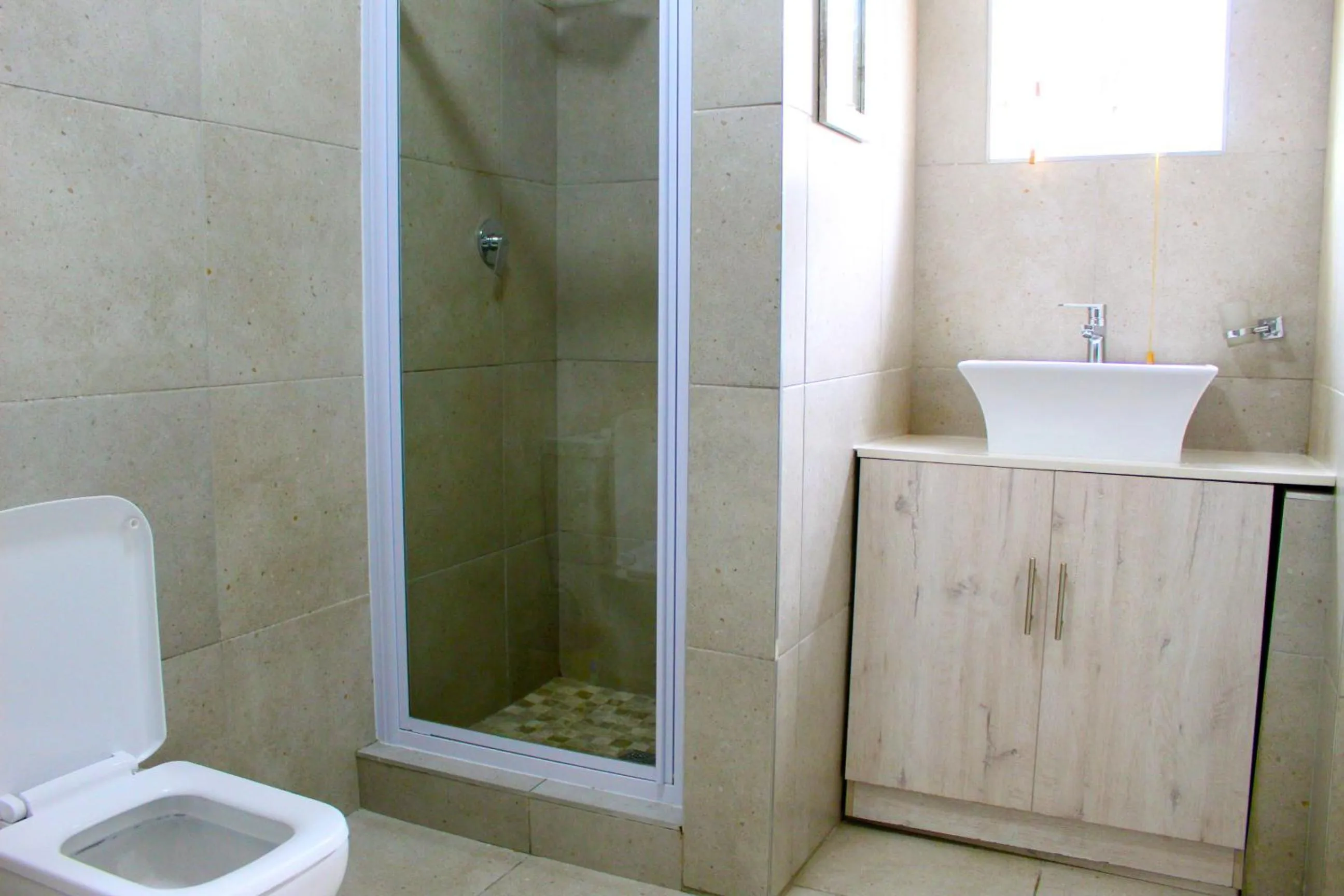 Shower in 103onWallace Self Catering Guest House