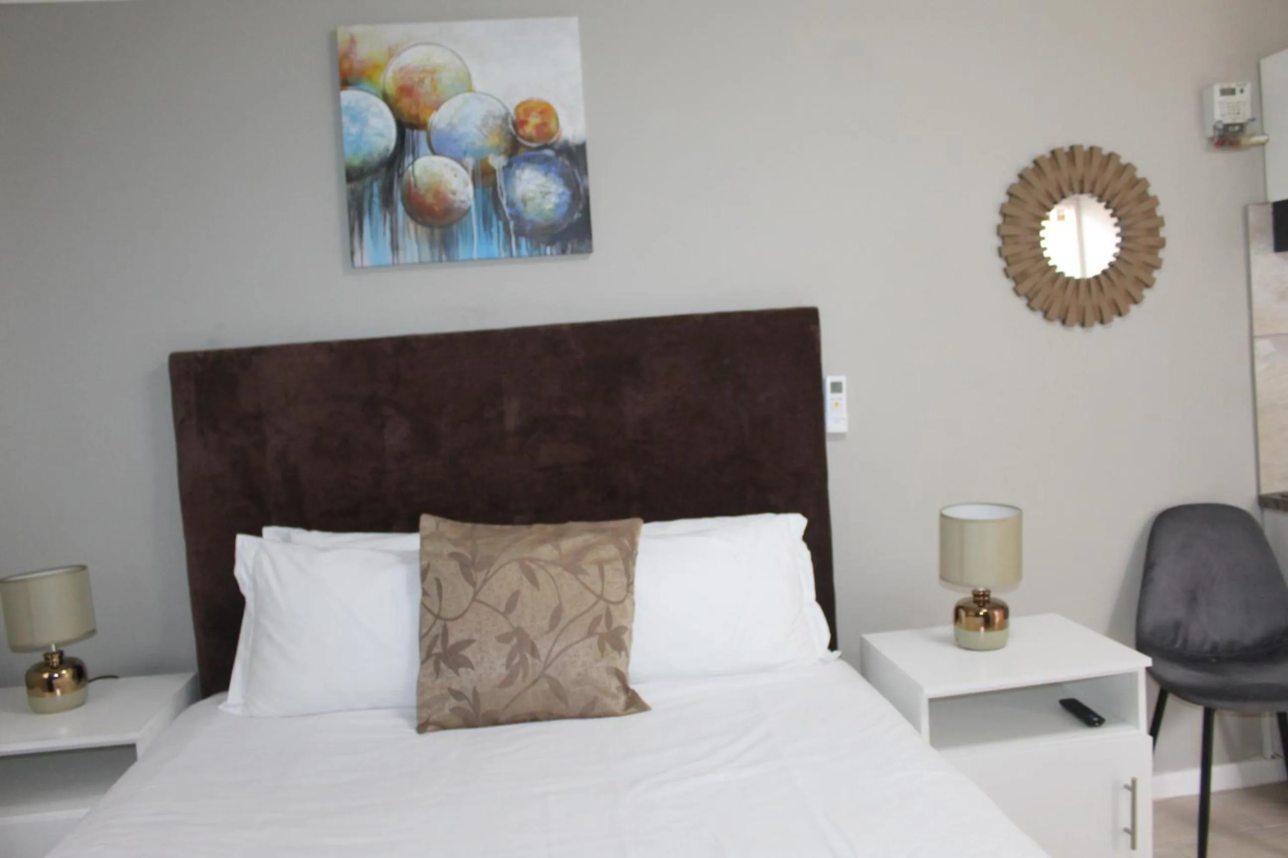 Bed in 103onWallace Self Catering Guest House