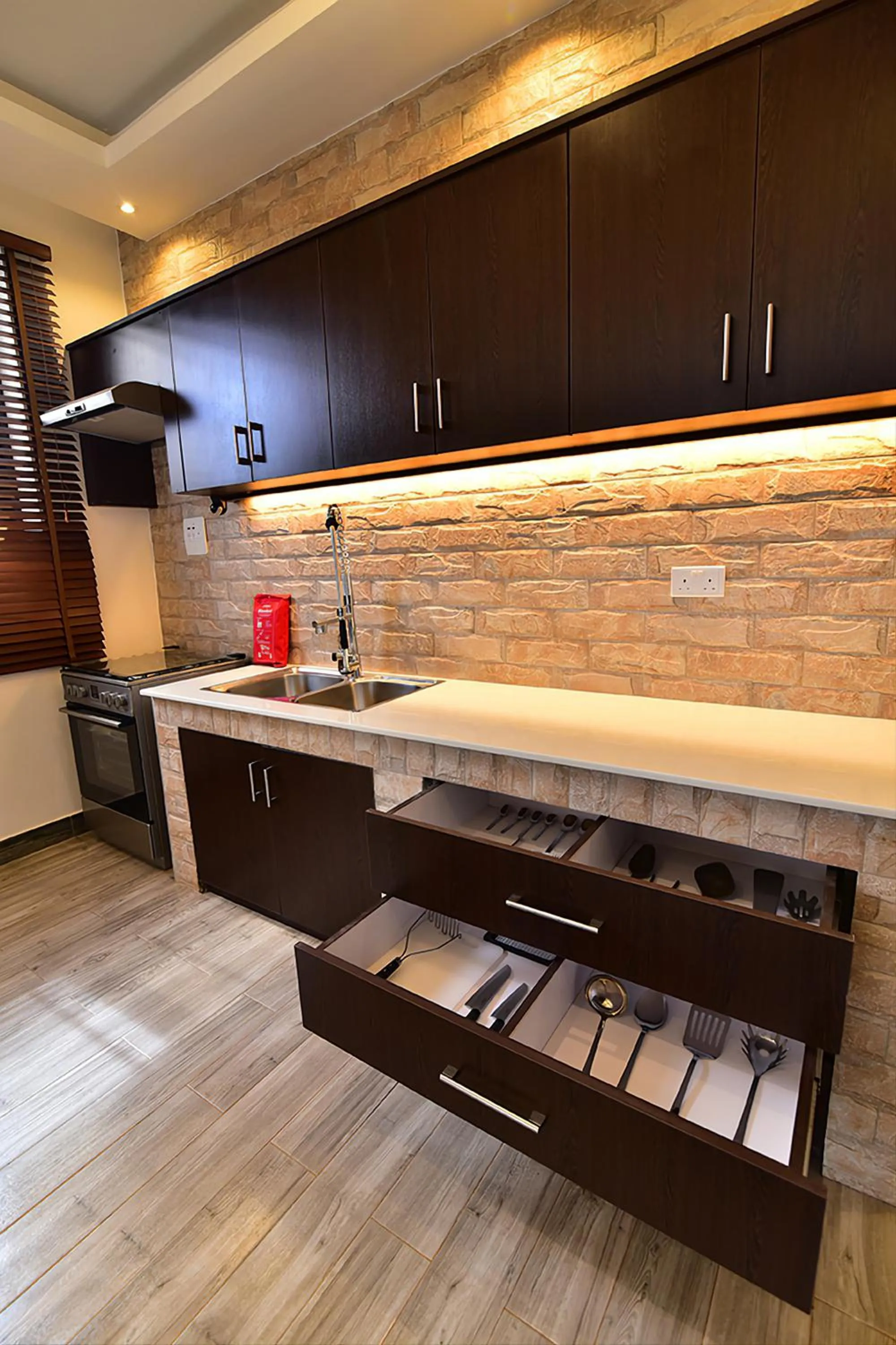 Kitchen or kitchenette in ENTEBBE-STAY Aparthotel - KITOORO