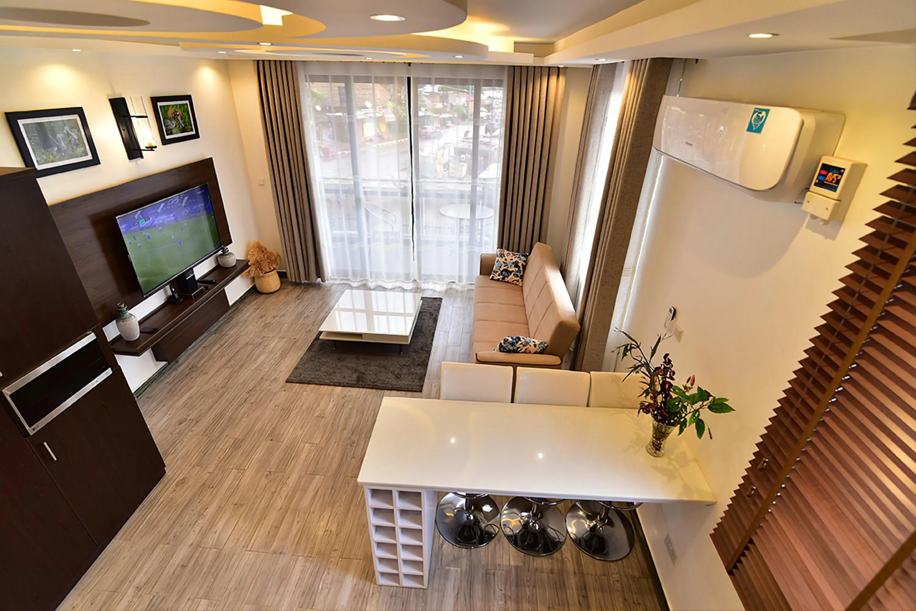 TV and multimedia in ENTEBBE-STAY Aparthotel - KITOORO