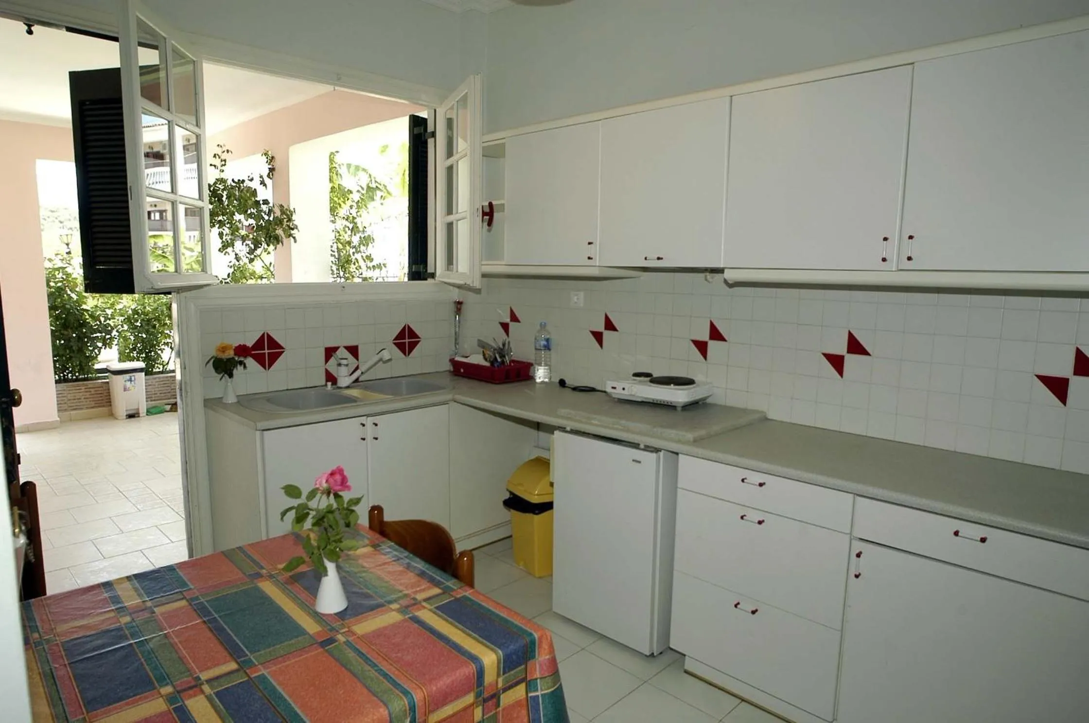 Kitchen or kitchenette in Acapulco Marinos Apartments- Adults Only