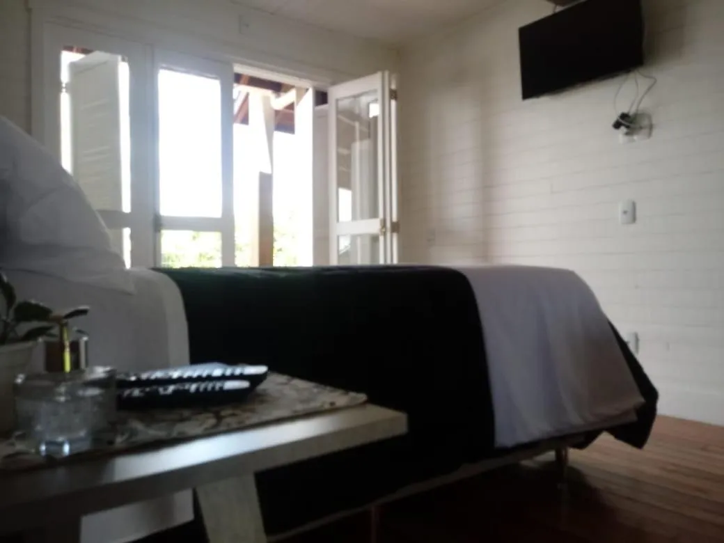 Bedroom in Pousada Toscana Cambará