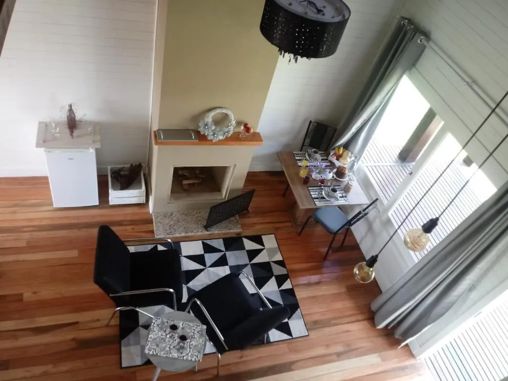 Living room in Pousada Toscana Cambará