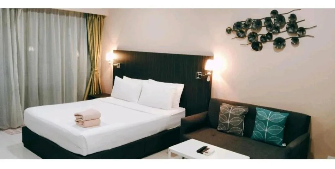 Bed in Signature Apartment at Mercu Summer Suites KLCC