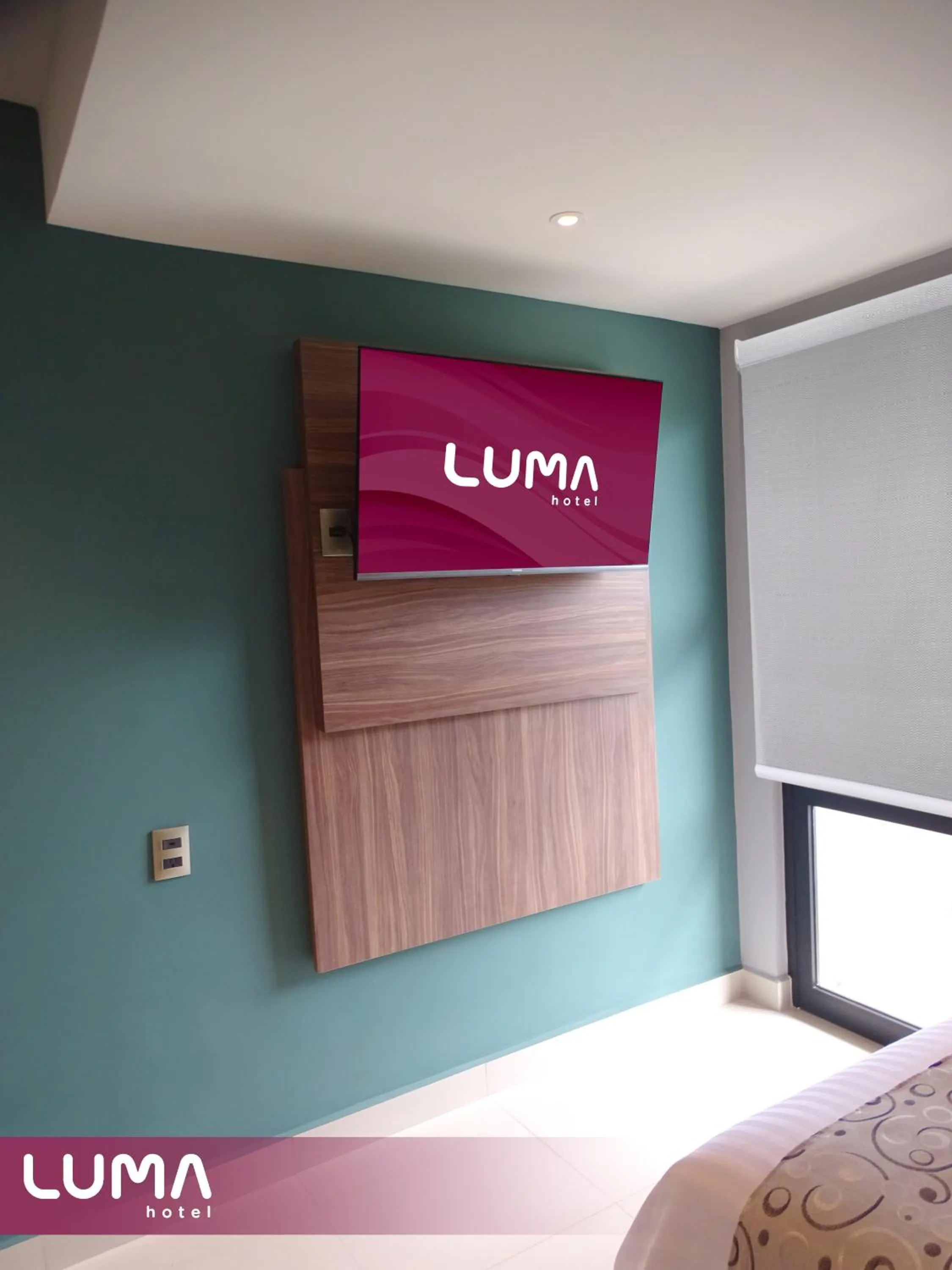 TV and multimedia, Bed in Hotel Luma by Kavia