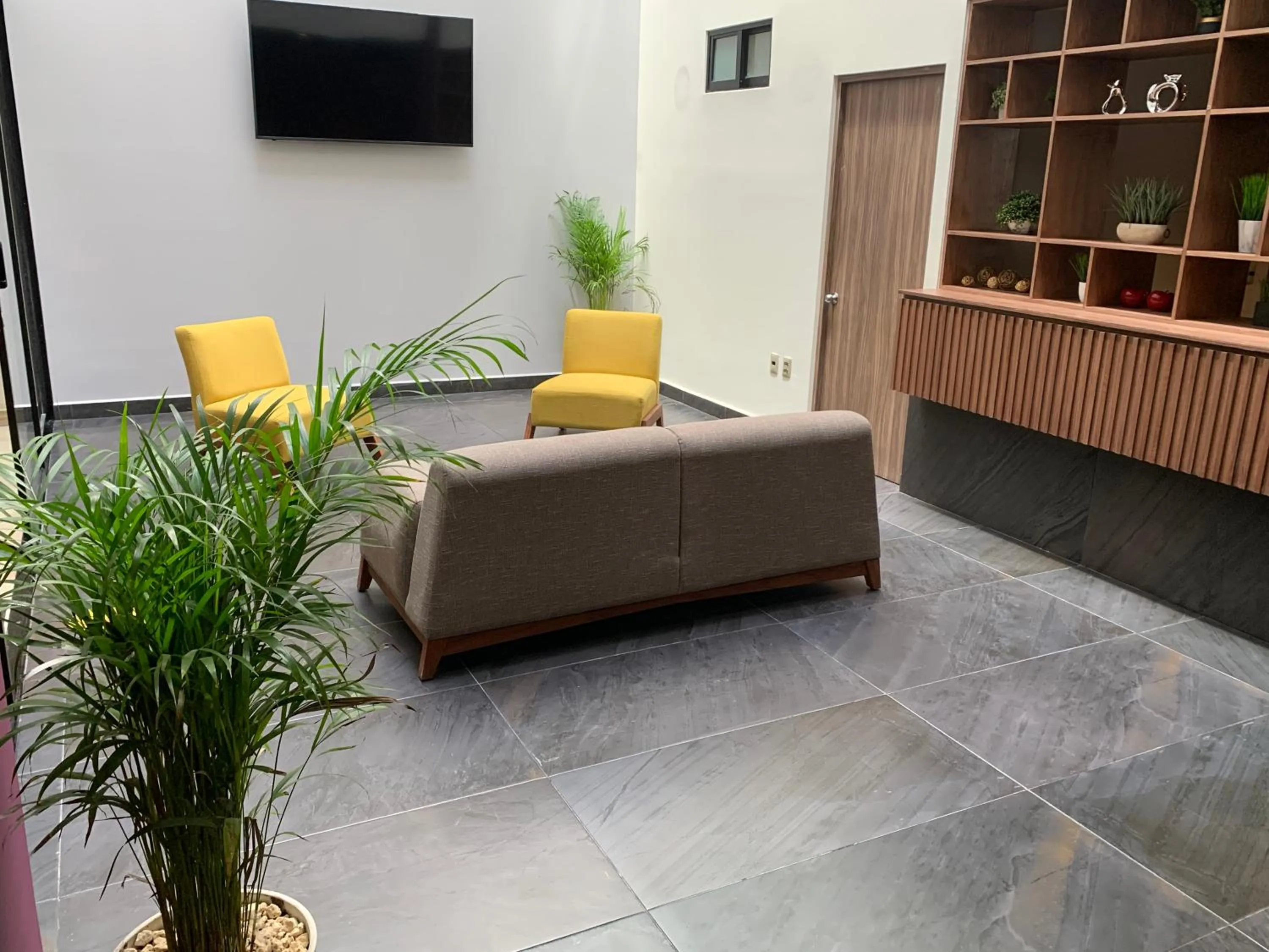 Communal lounge/ TV room in Hotel Luma by Kavia