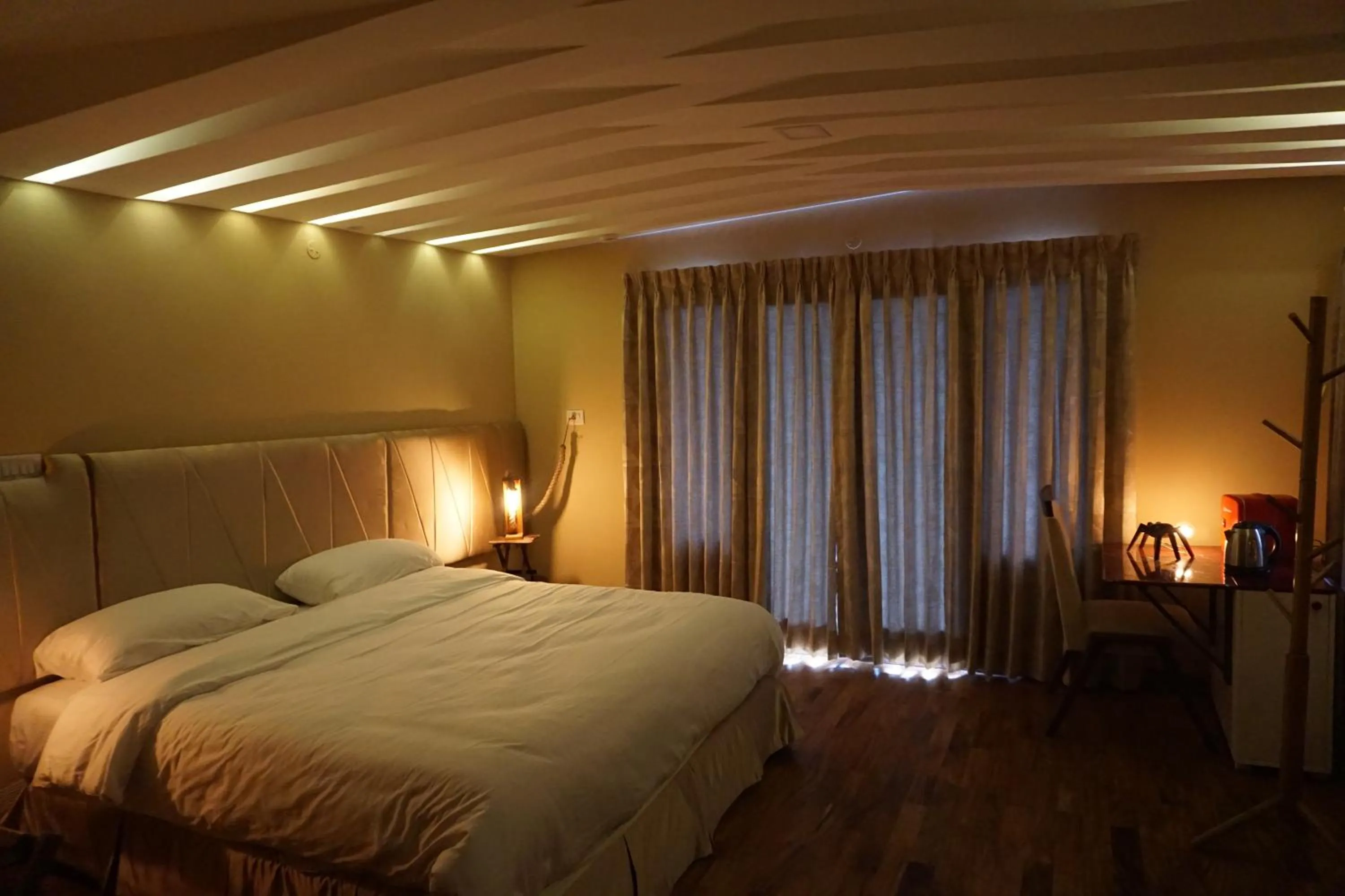 Photo of the whole room, Bed in COTTAGES BY THE CREEK.