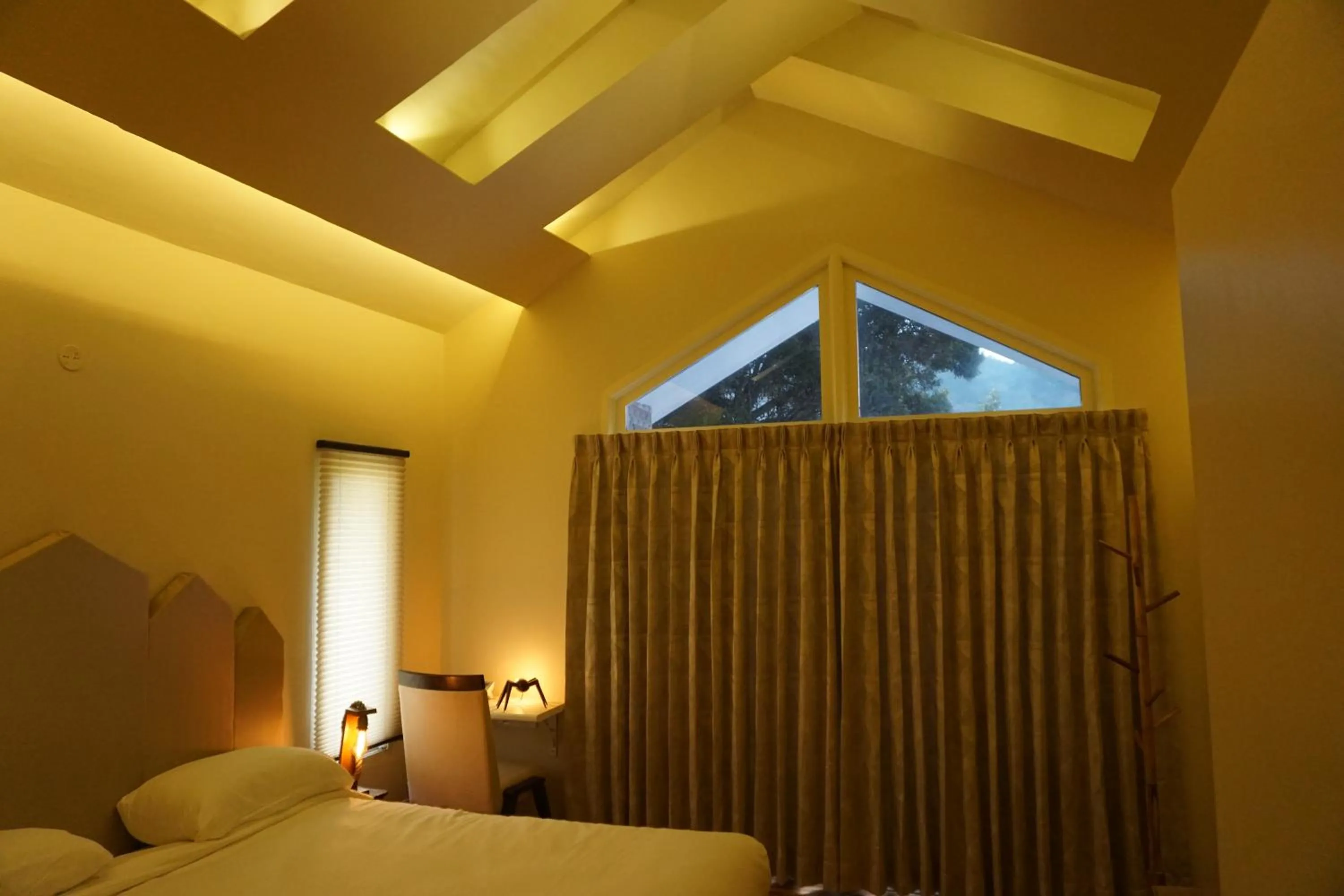 Bed in COTTAGES BY THE CREEK.