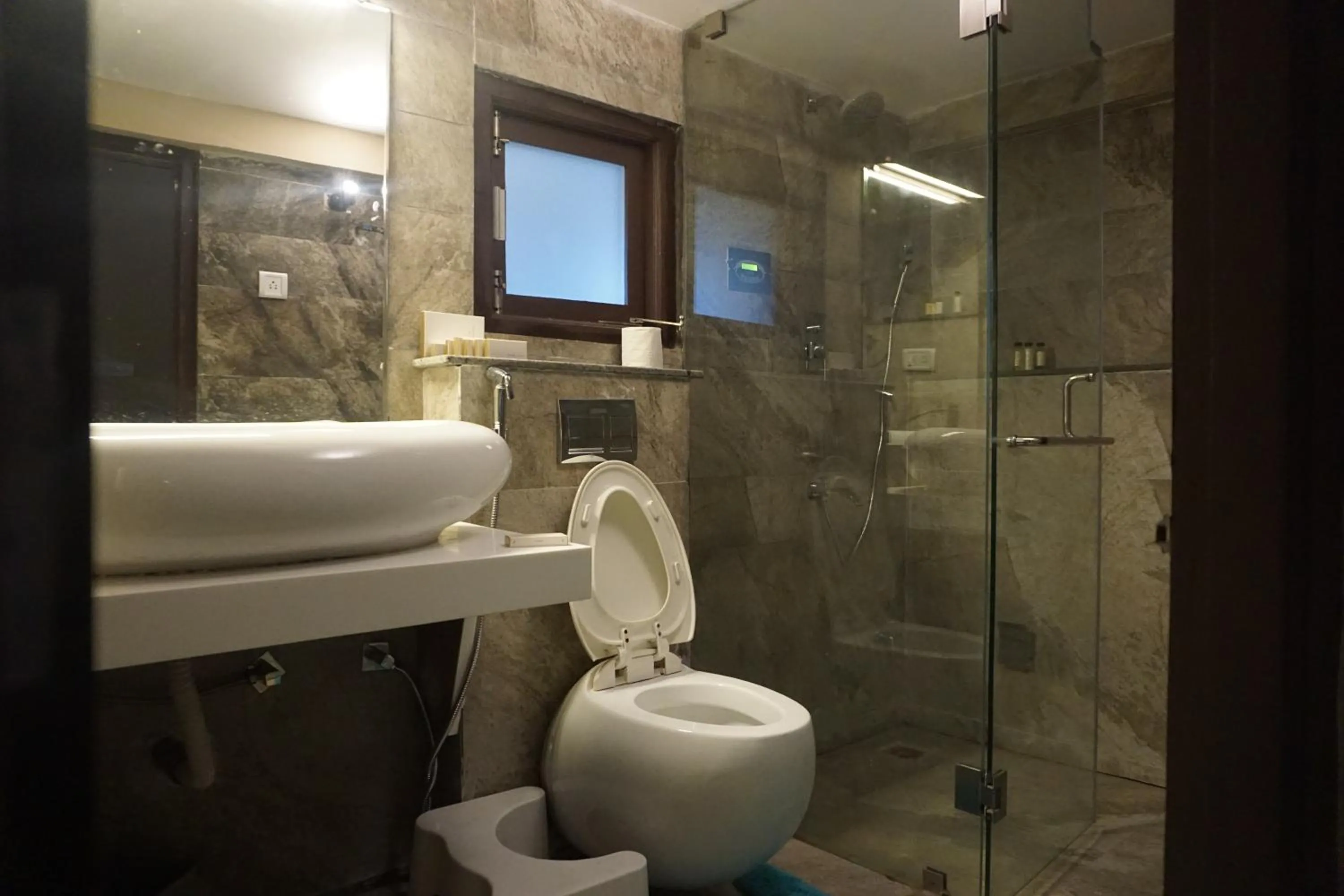 Bathroom in COTTAGES BY THE CREEK.