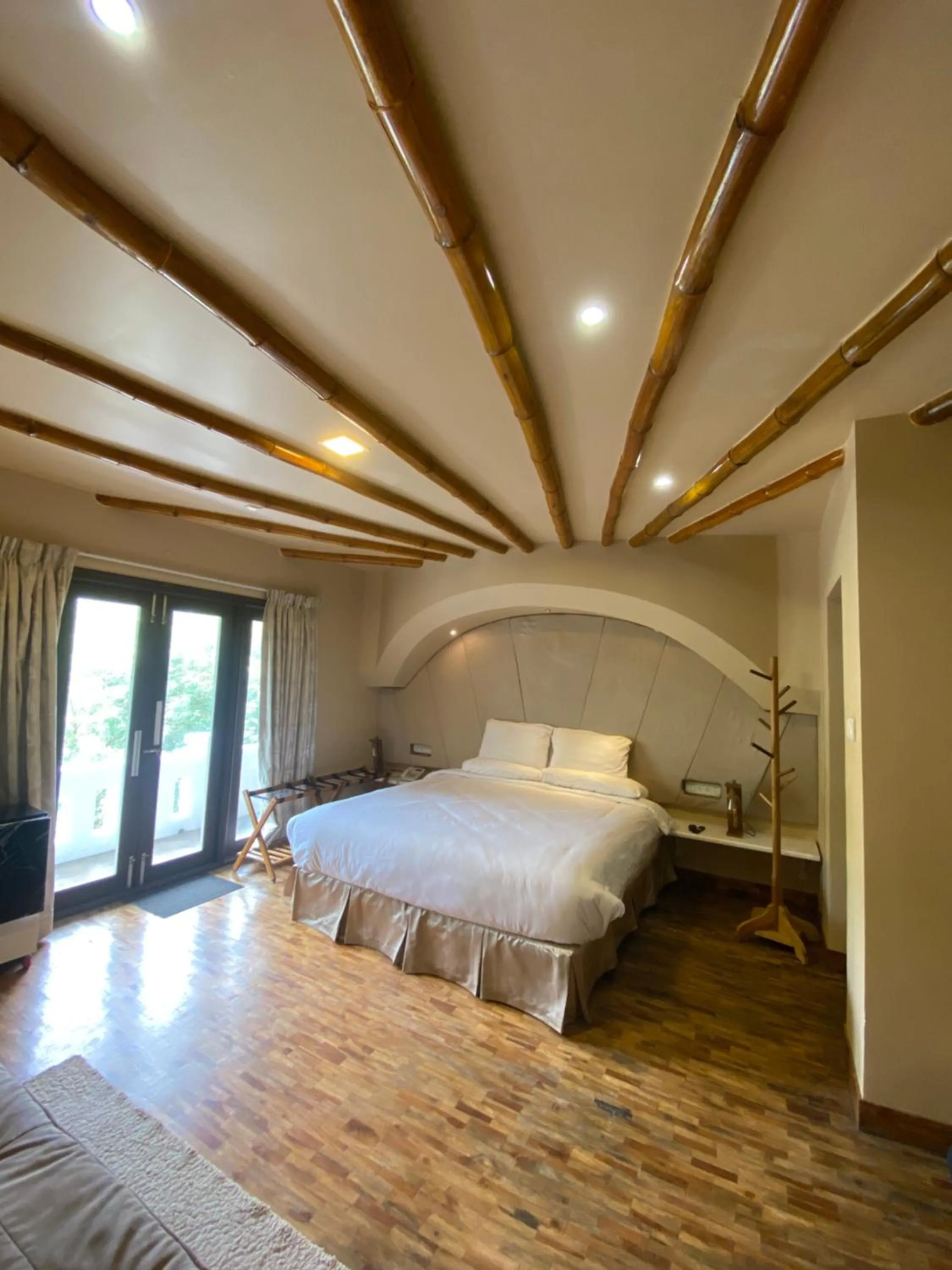 Bed in COTTAGES BY THE CREEK.