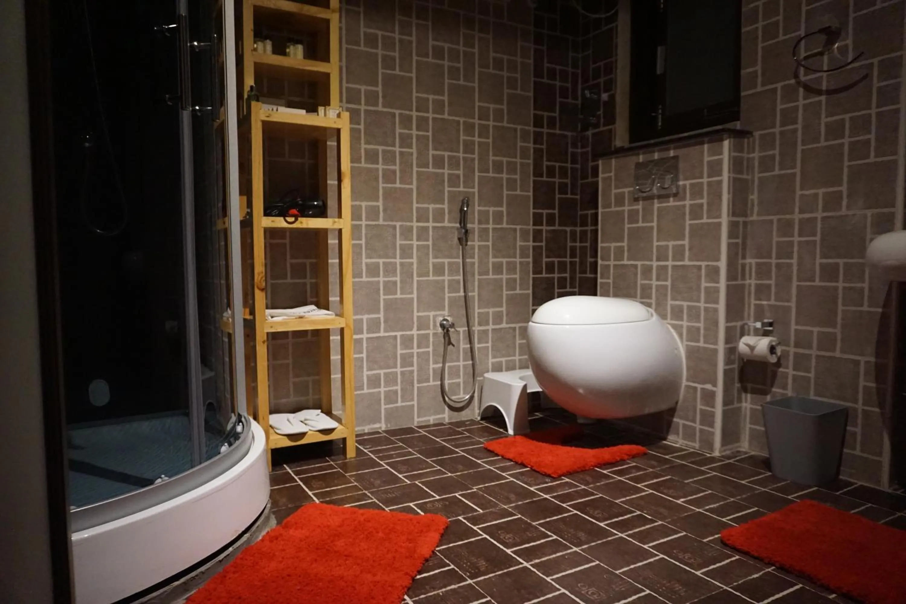 Bathroom in COTTAGES BY THE CREEK.