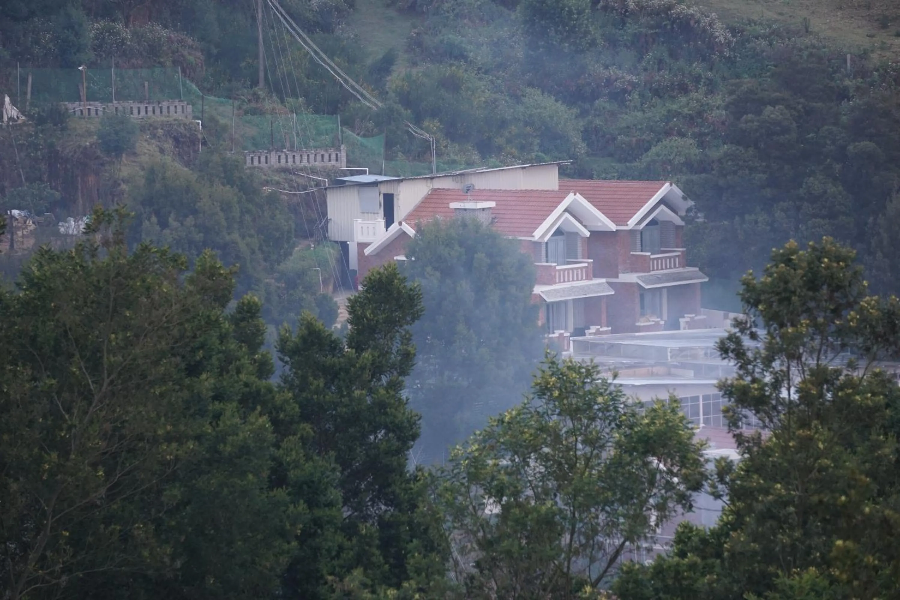 Property building in COTTAGES BY THE CREEK.