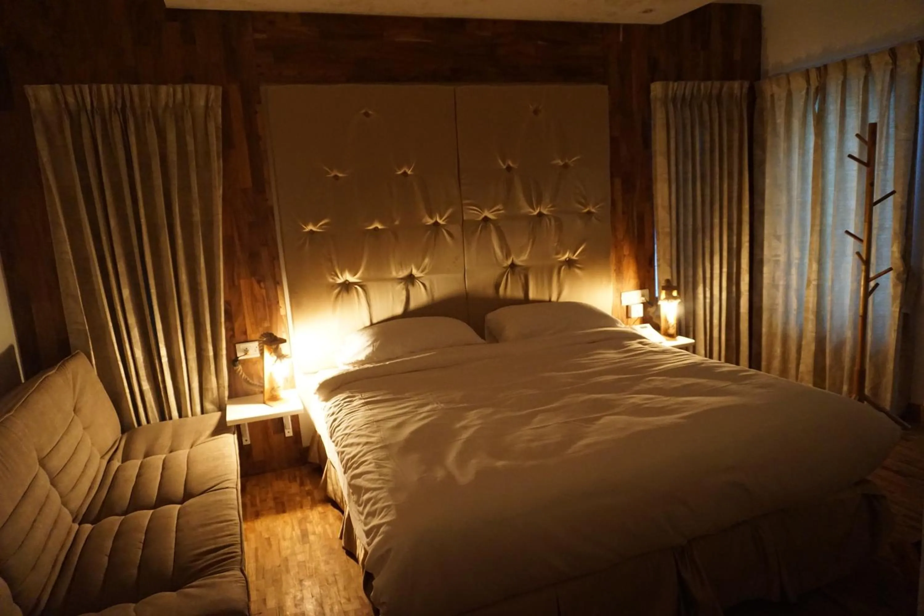 Bed in COTTAGES BY THE CREEK.
