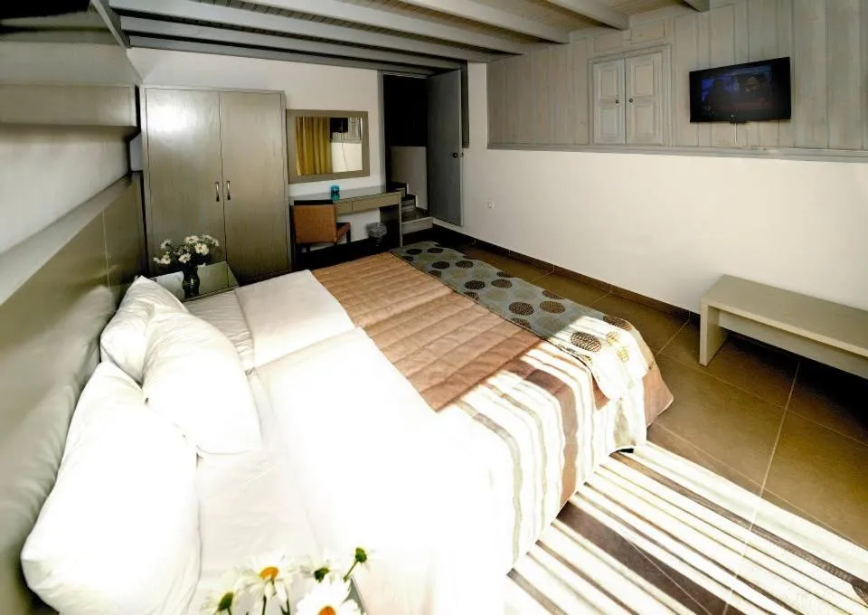 Bed in Apolis Beachscape Hotel