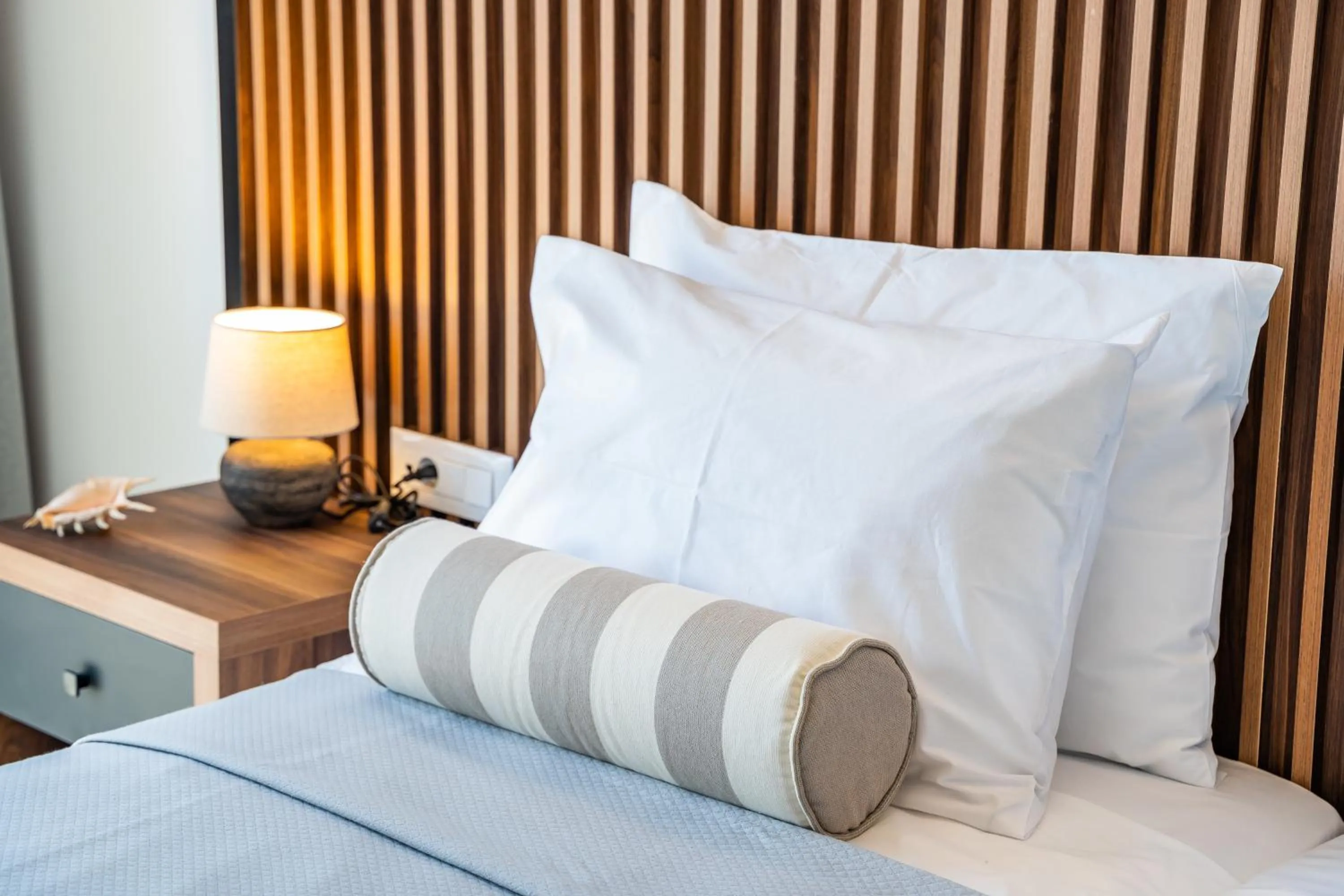 Bed in Apolis Beachscape Hotel