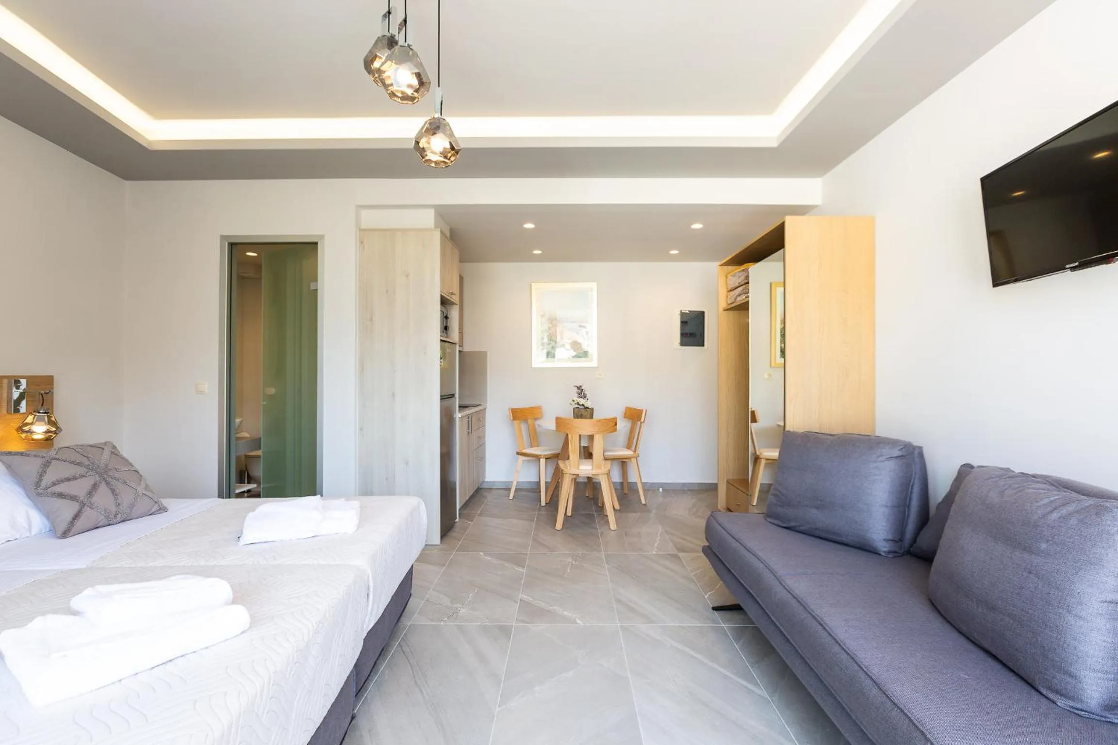 Photo of the whole room, Bed in Akrogiali Apartments