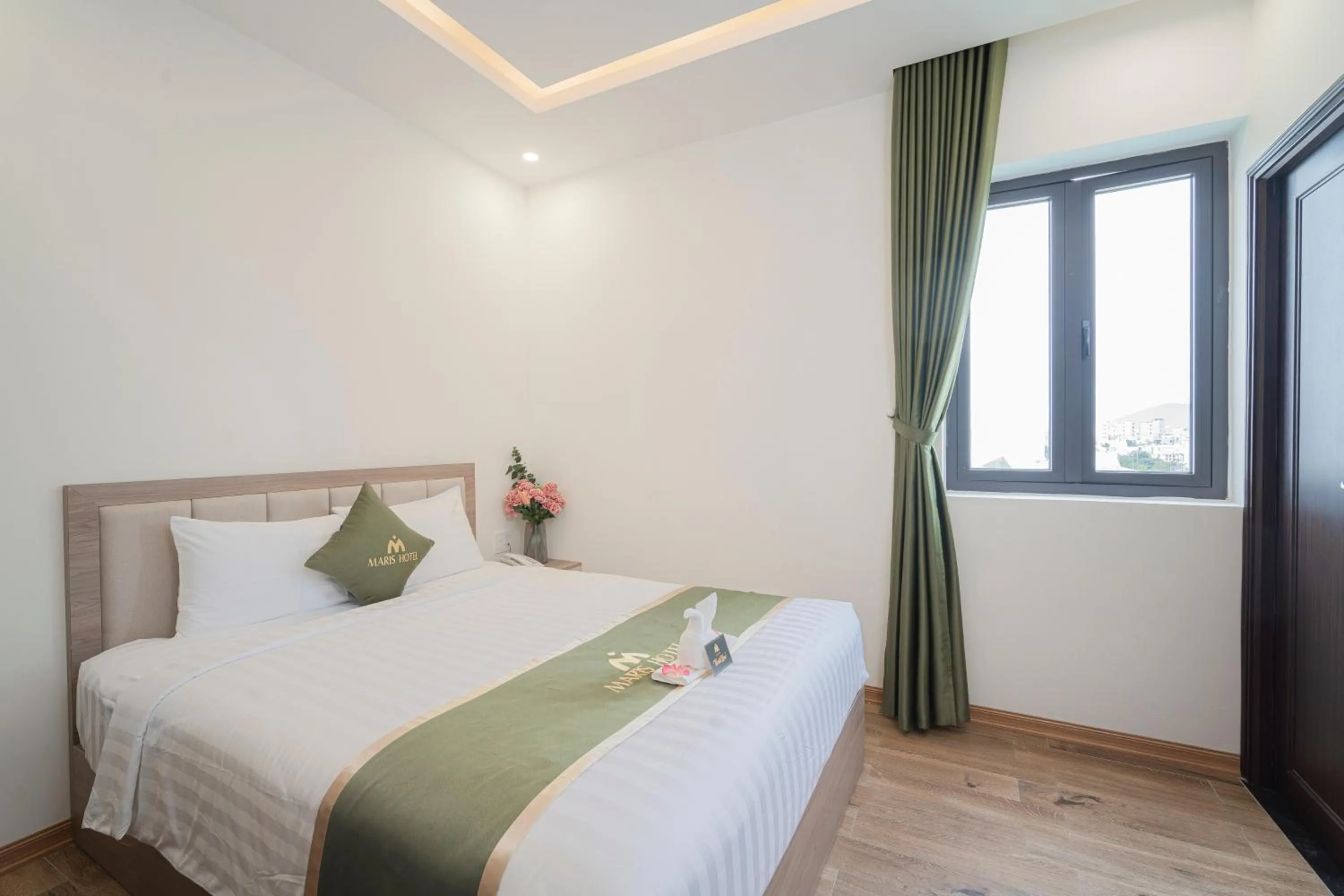 Bed in Maris Da Nang Hotel & Apartment