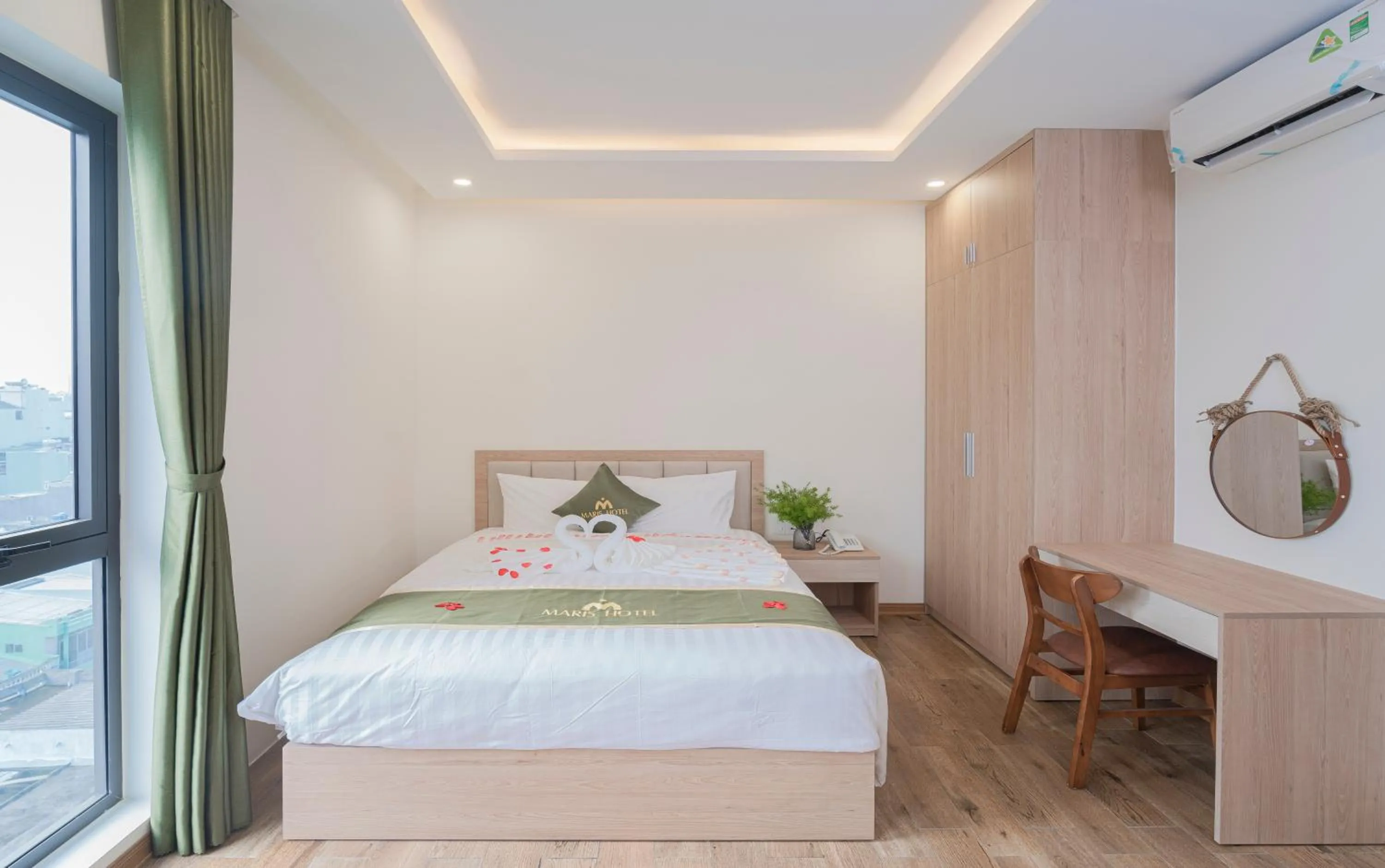 Bed in Maris Da Nang Hotel & Apartment