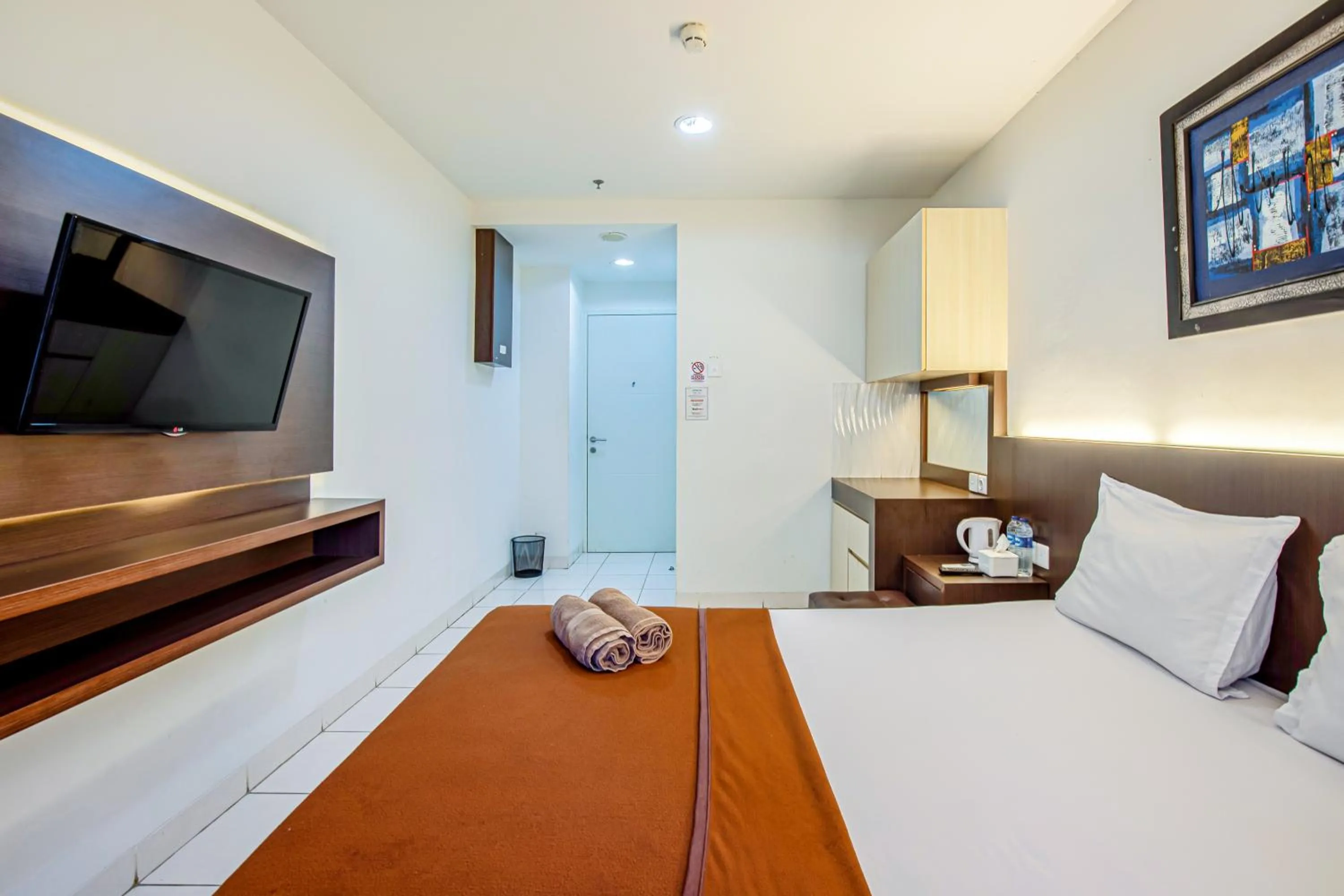 Bed in Skyview Sentul Tower Apartments