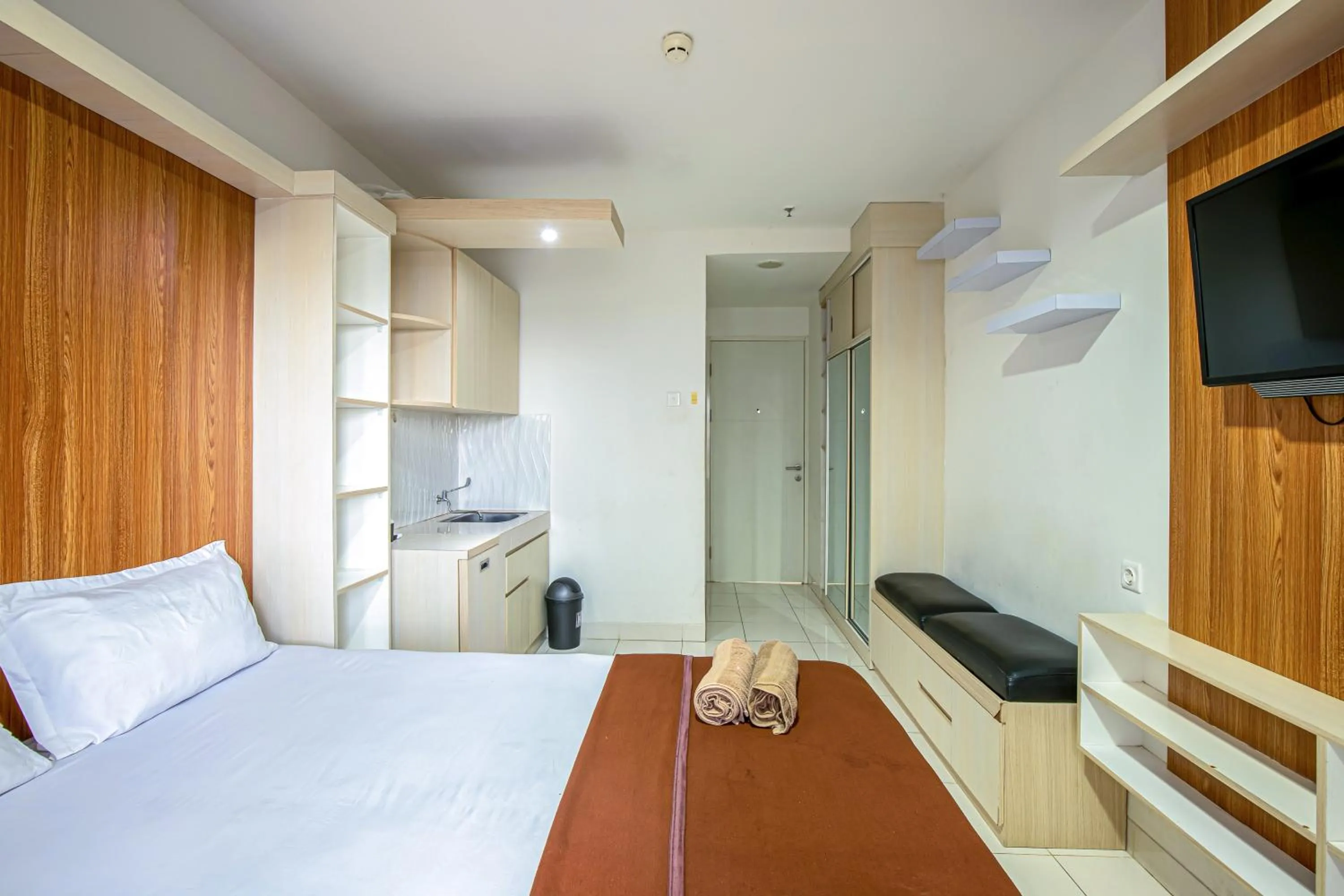 Bed in Skyview Sentul Tower Apartments