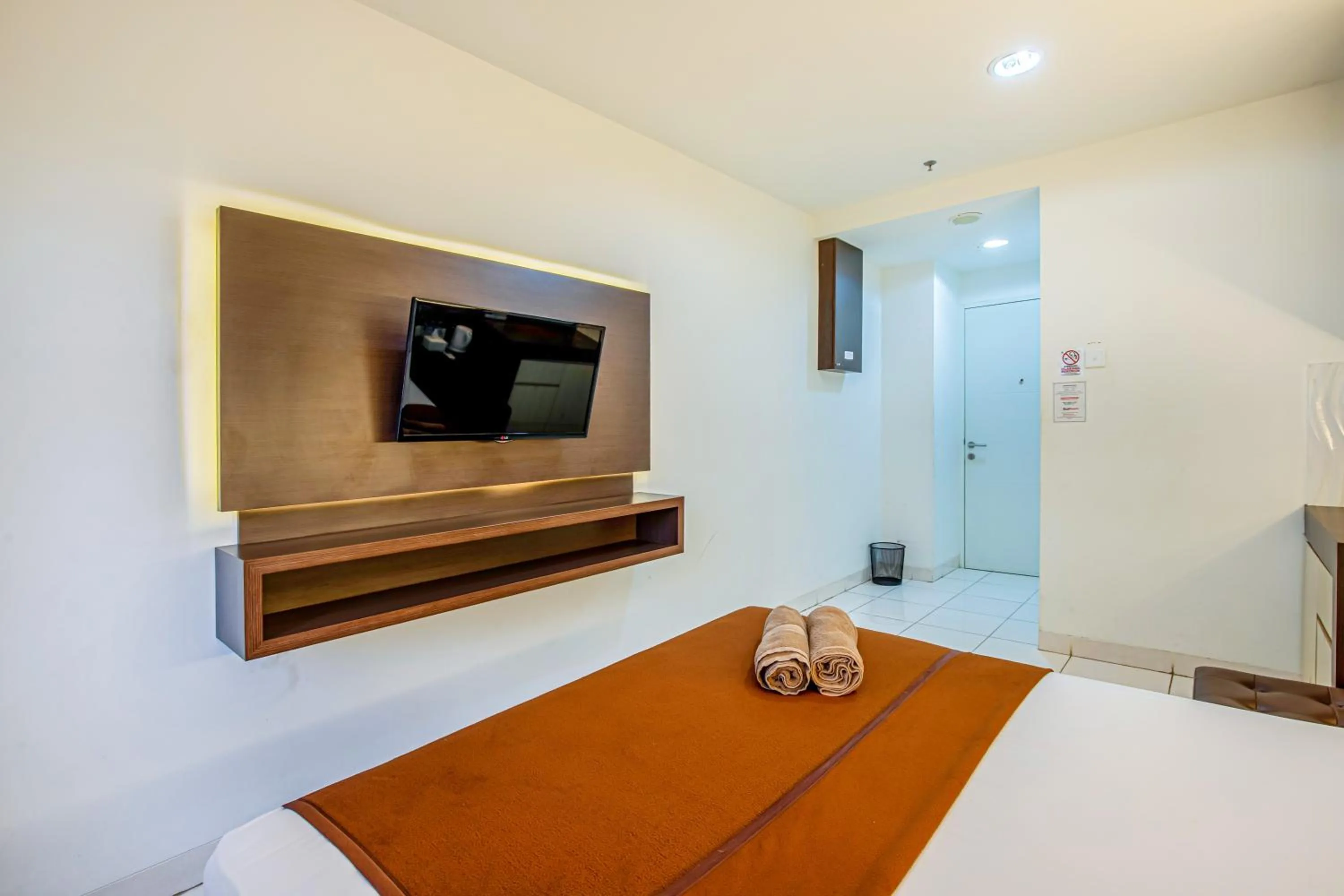 Bed in Skyview Sentul Tower Apartments