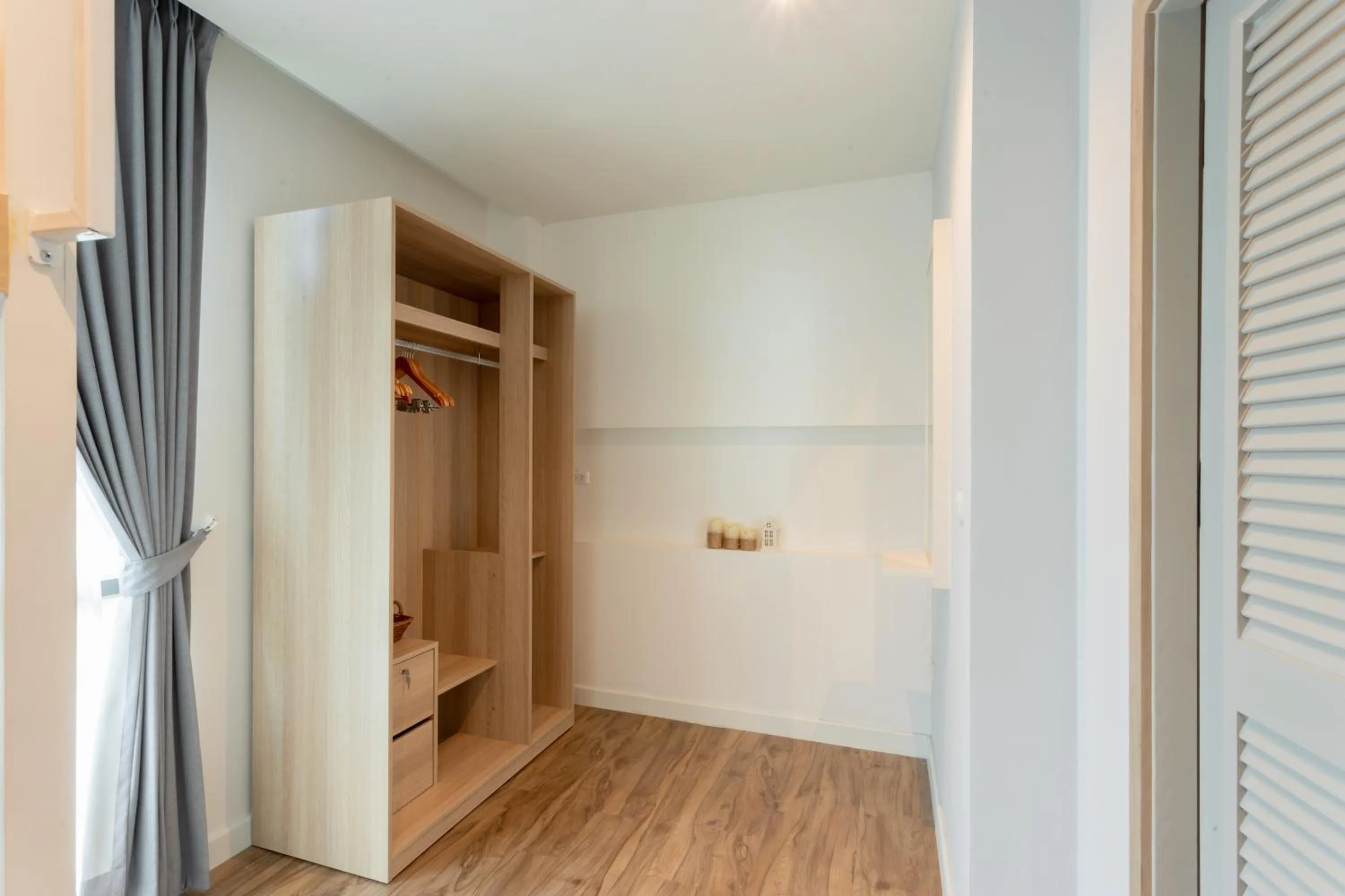 wardrobe in Lanna Bonita Boutique Hotel