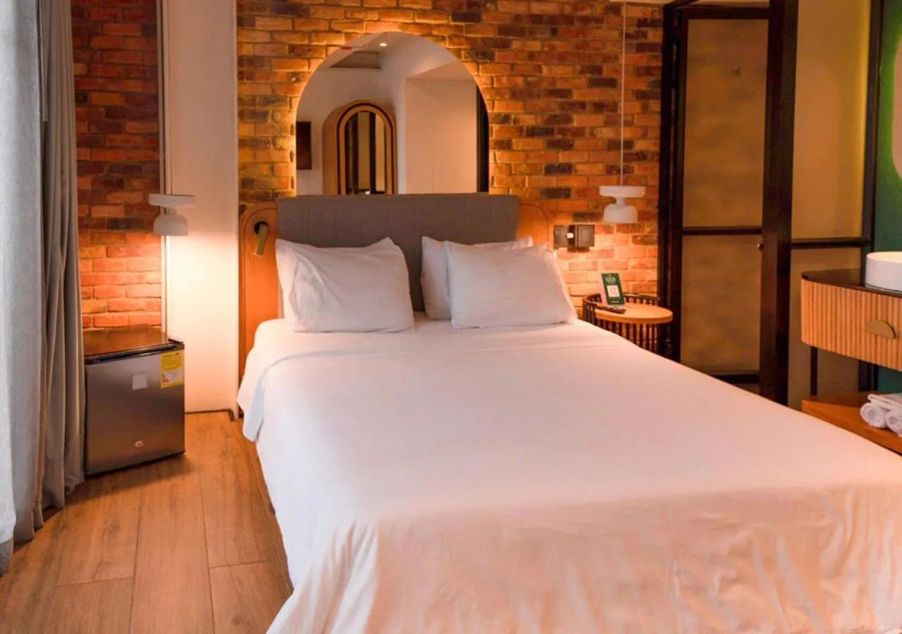 Bed in Nomada Hotel Origen