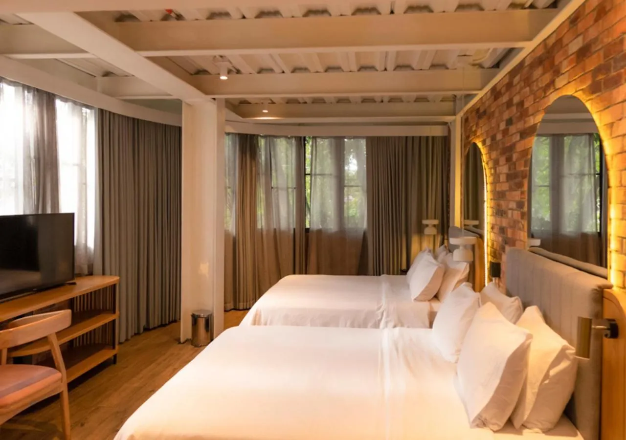 Bed in Nomada Hotel Origen