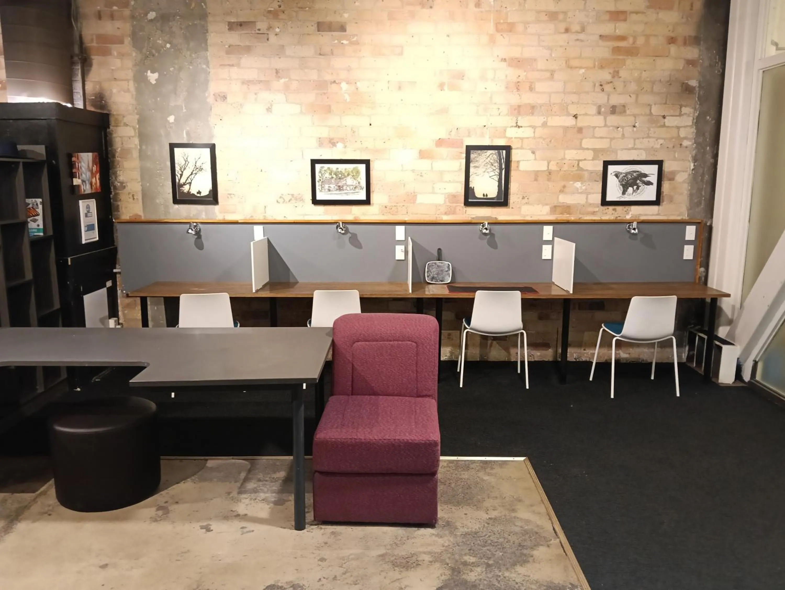 Communal lounge/ TV room in Oceanic Hostel