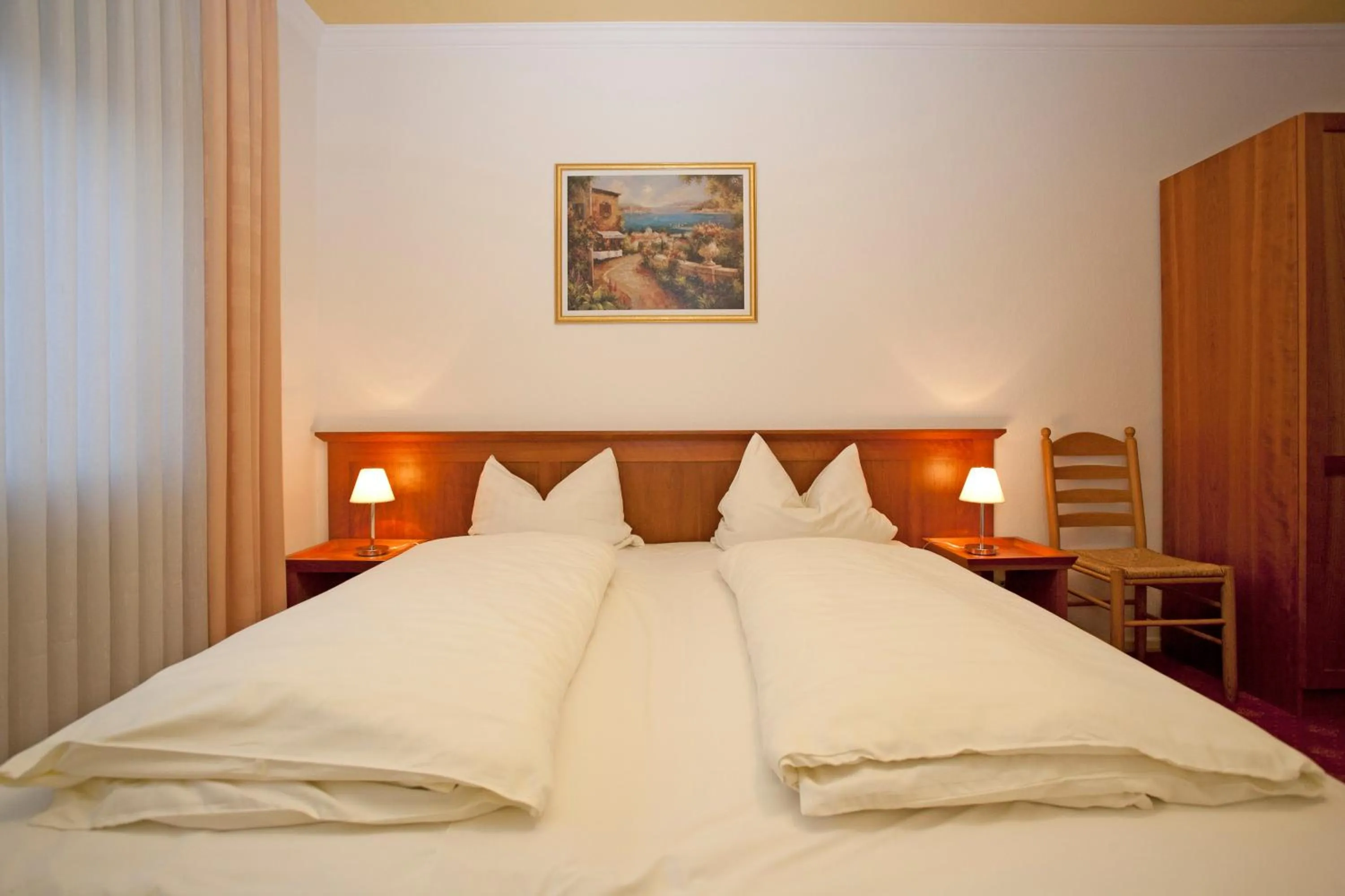 Bed in Hotel Mennicken