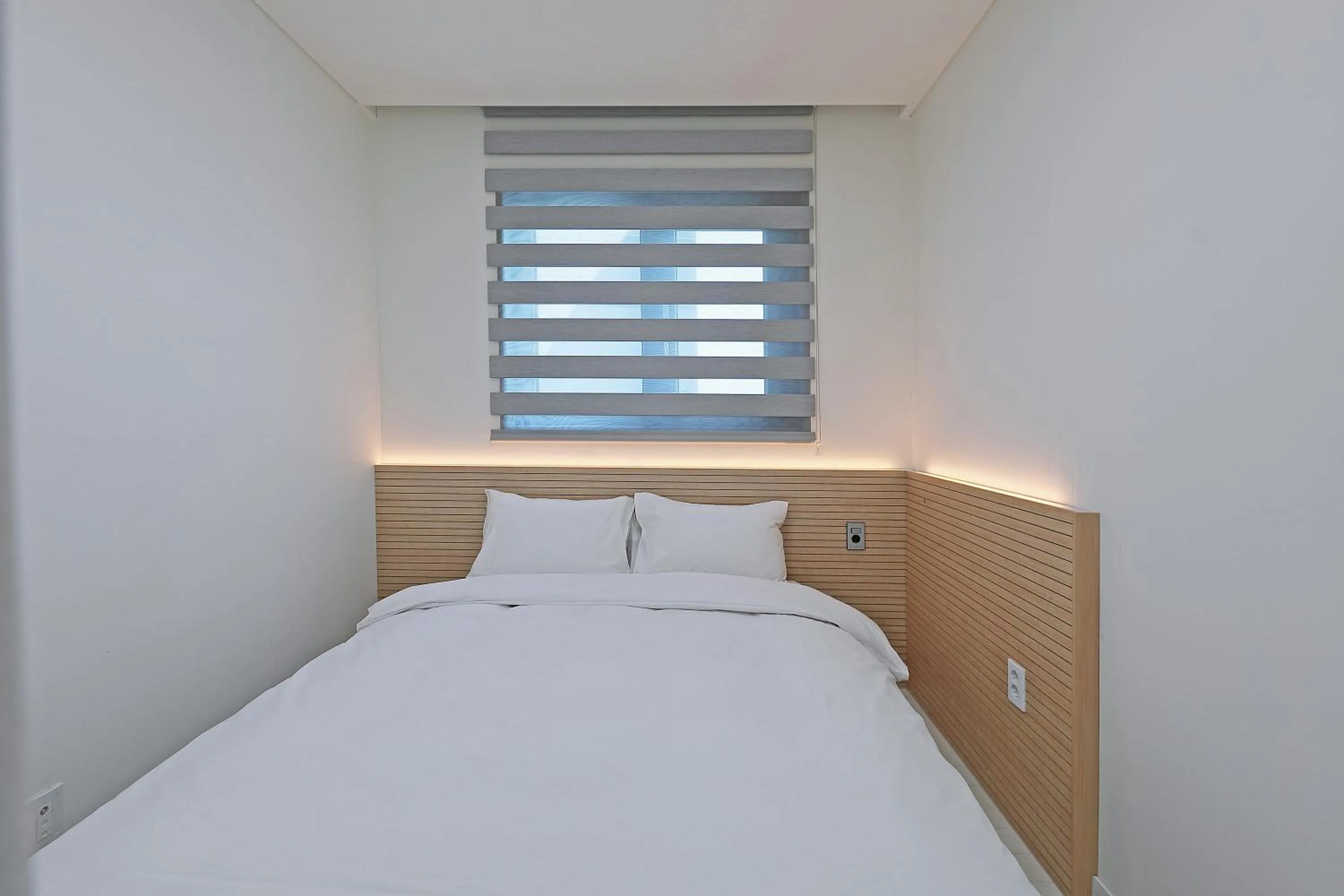 Bed in World Sky Residence Hotel