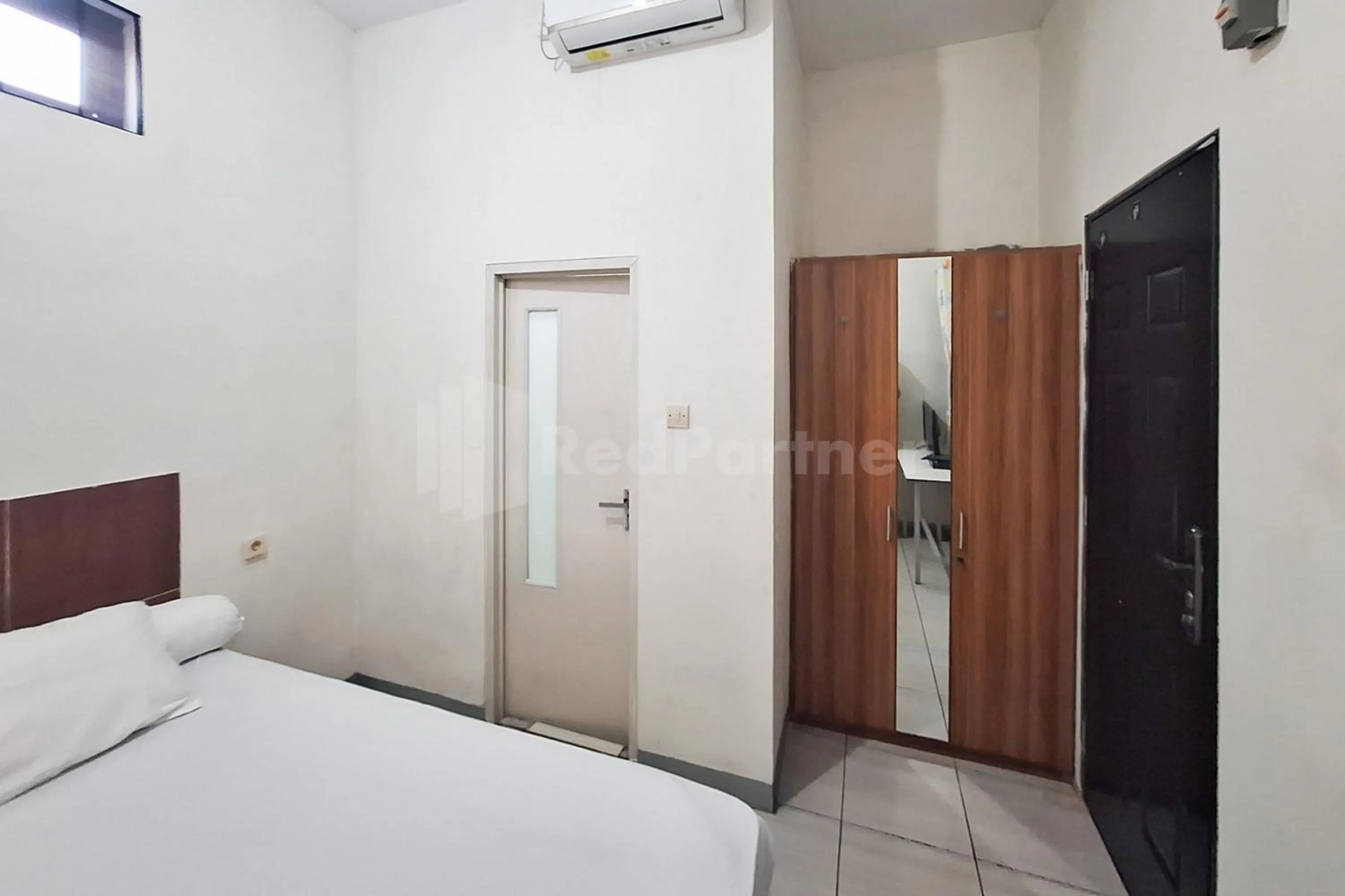 Bed in Joy Homestay At Pulomas RedPartner