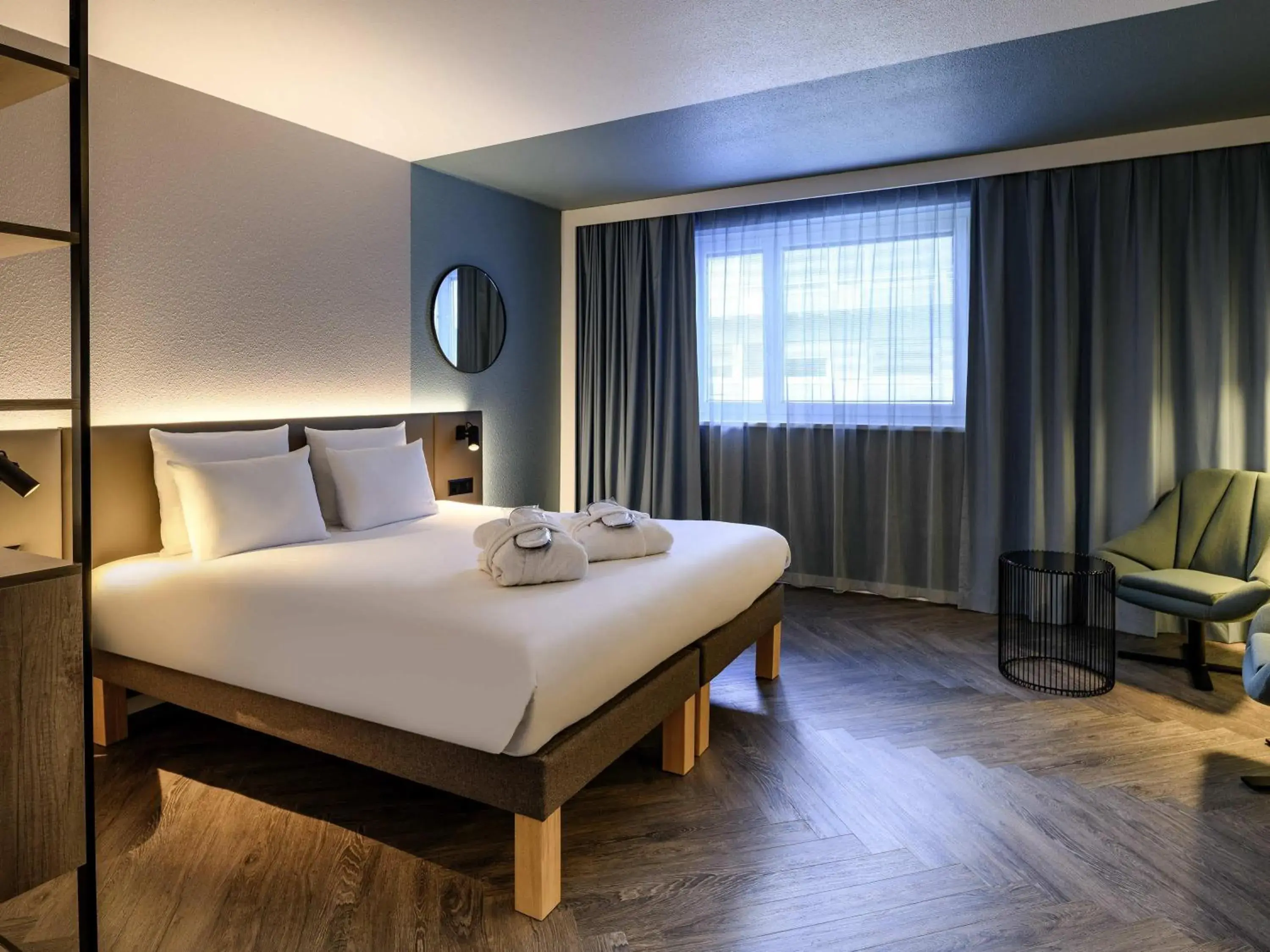 Two Bedroom Suite with Double Bed and Sofa in Novotel Zurich City West Two Bedroom Suite with Double Bed and Sofa in Novotel Zurich City West