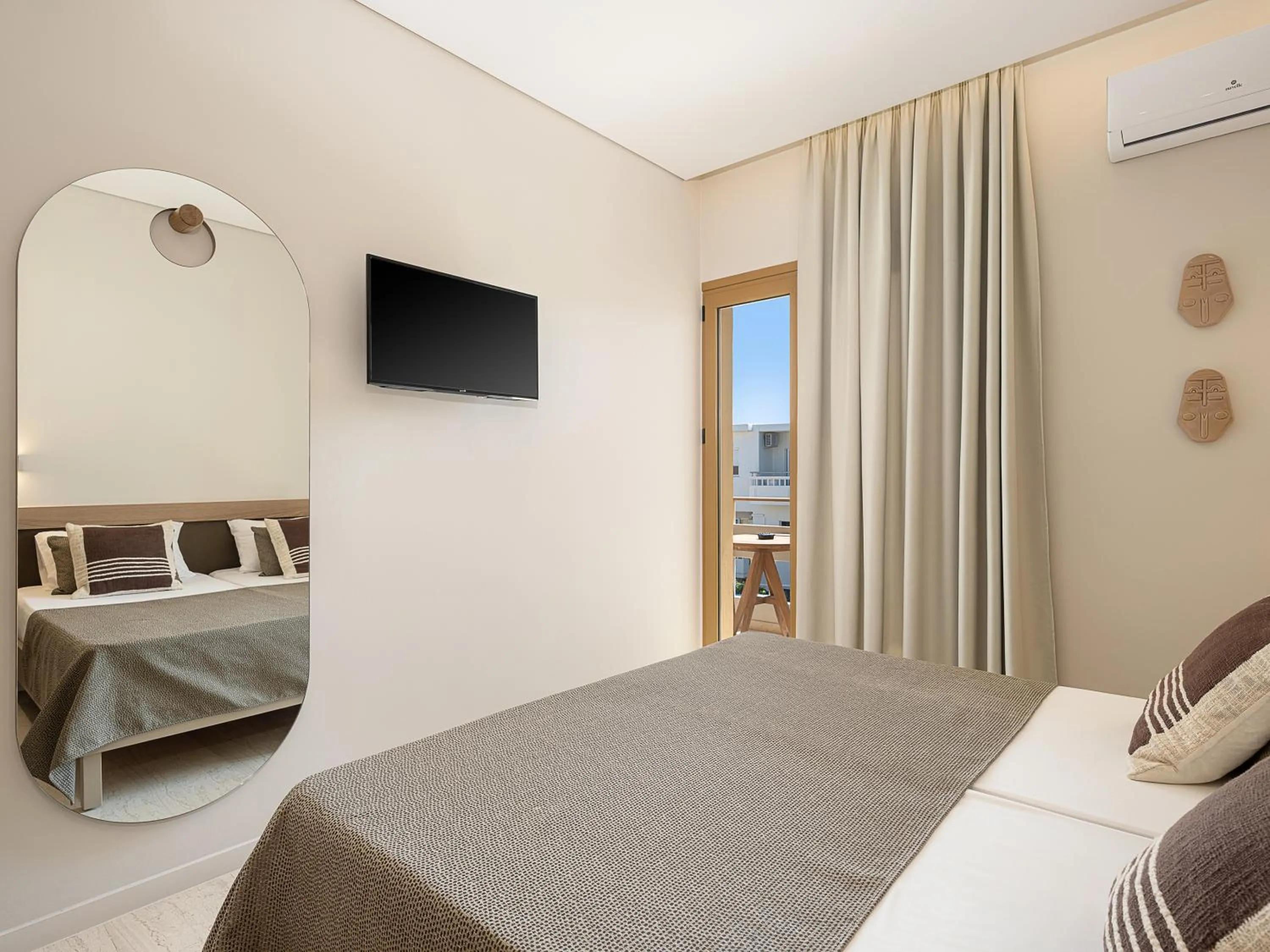 Bed in Esperides Beach Hotel Apartments