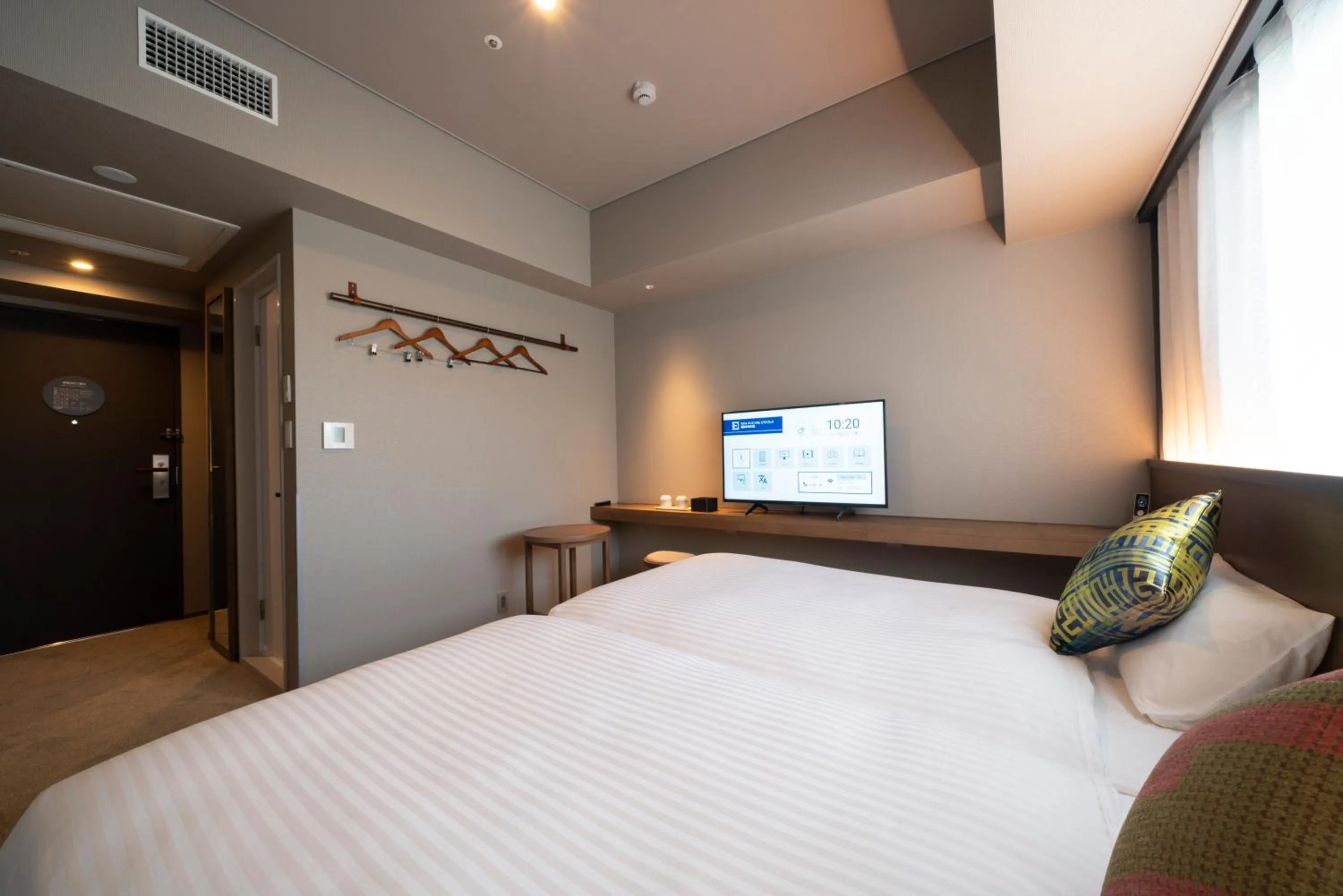 Photo of the whole room, Bed in Hotel Oriental Express Fukuoka Nakasu Kawabata