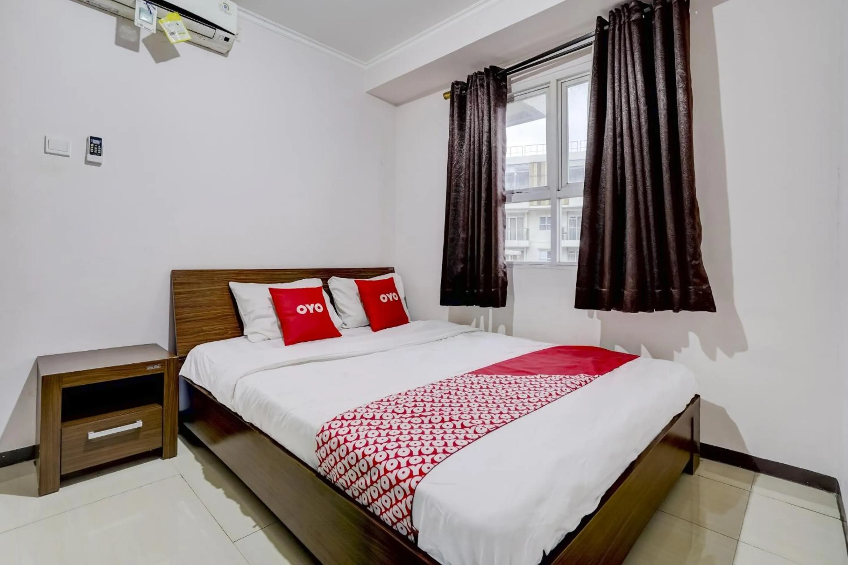 Bedroom in Collection O 90205 Queen Rent Apartment Gateway Pasteur