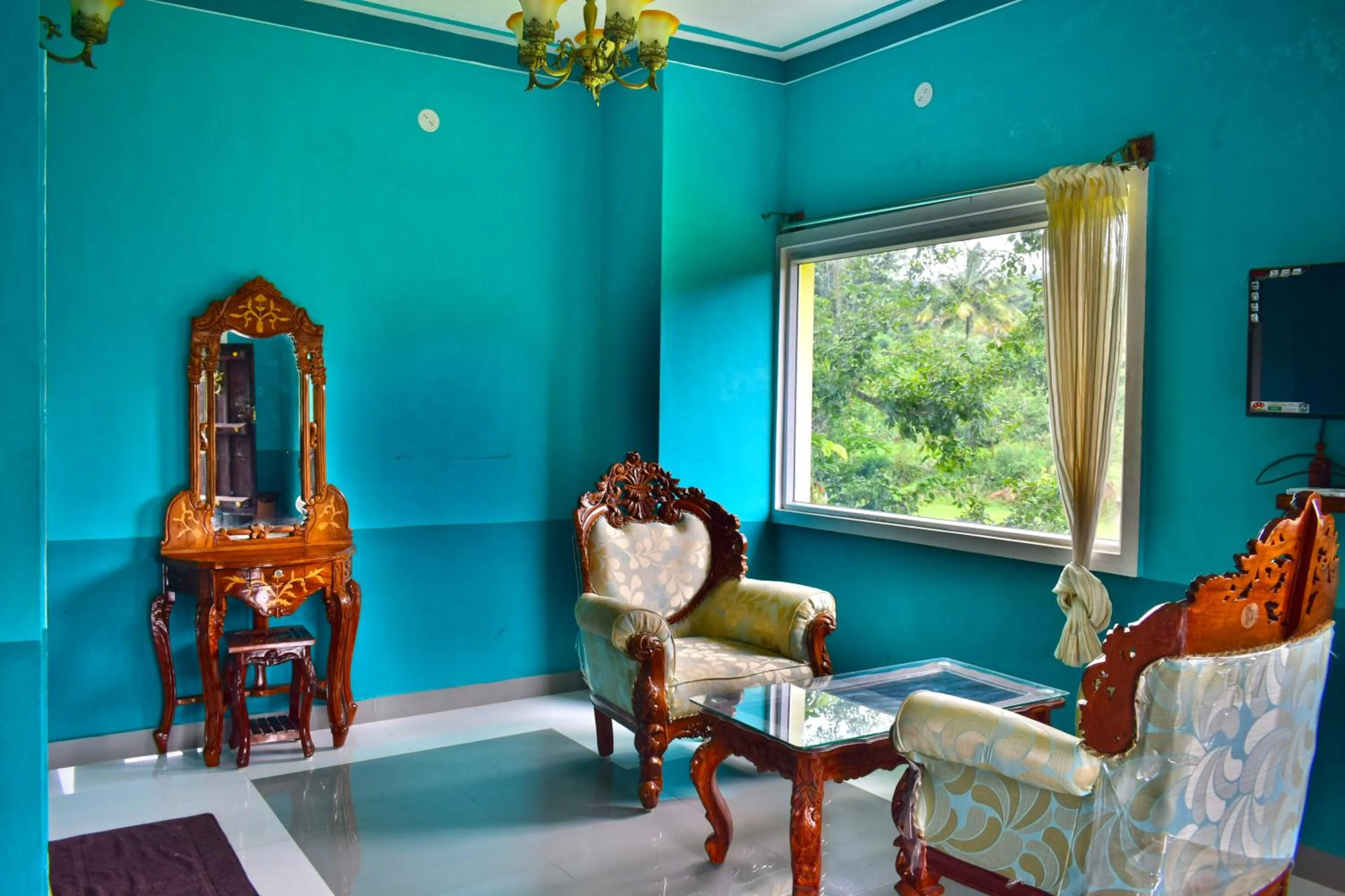 Seating area in Hill Fort Hotel And Resorts Yelagiri Hills