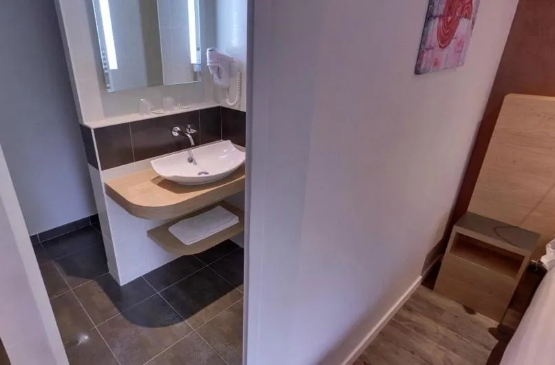 Bathroom in Hôtel de la Louée